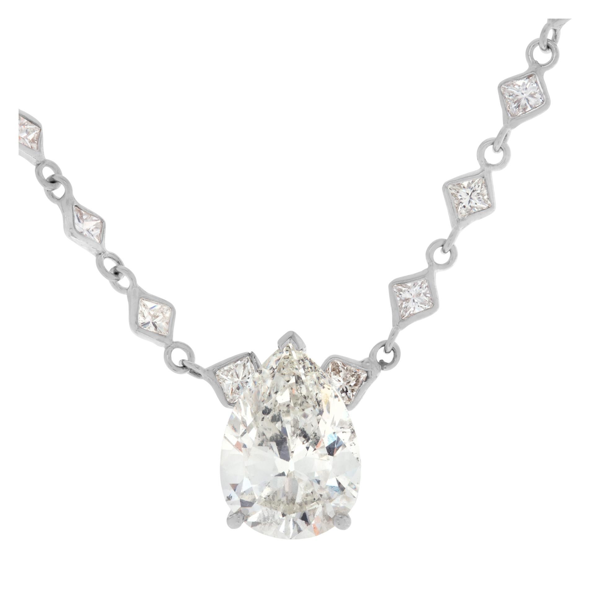 GIA certified center pear shape diamond 3.84 carats (J color, SI2 clarity) on a diamonds-by-the-inch necklace with 5 carats of princess cut diamonds averaging H color, SI clarity. Length 16 inches.