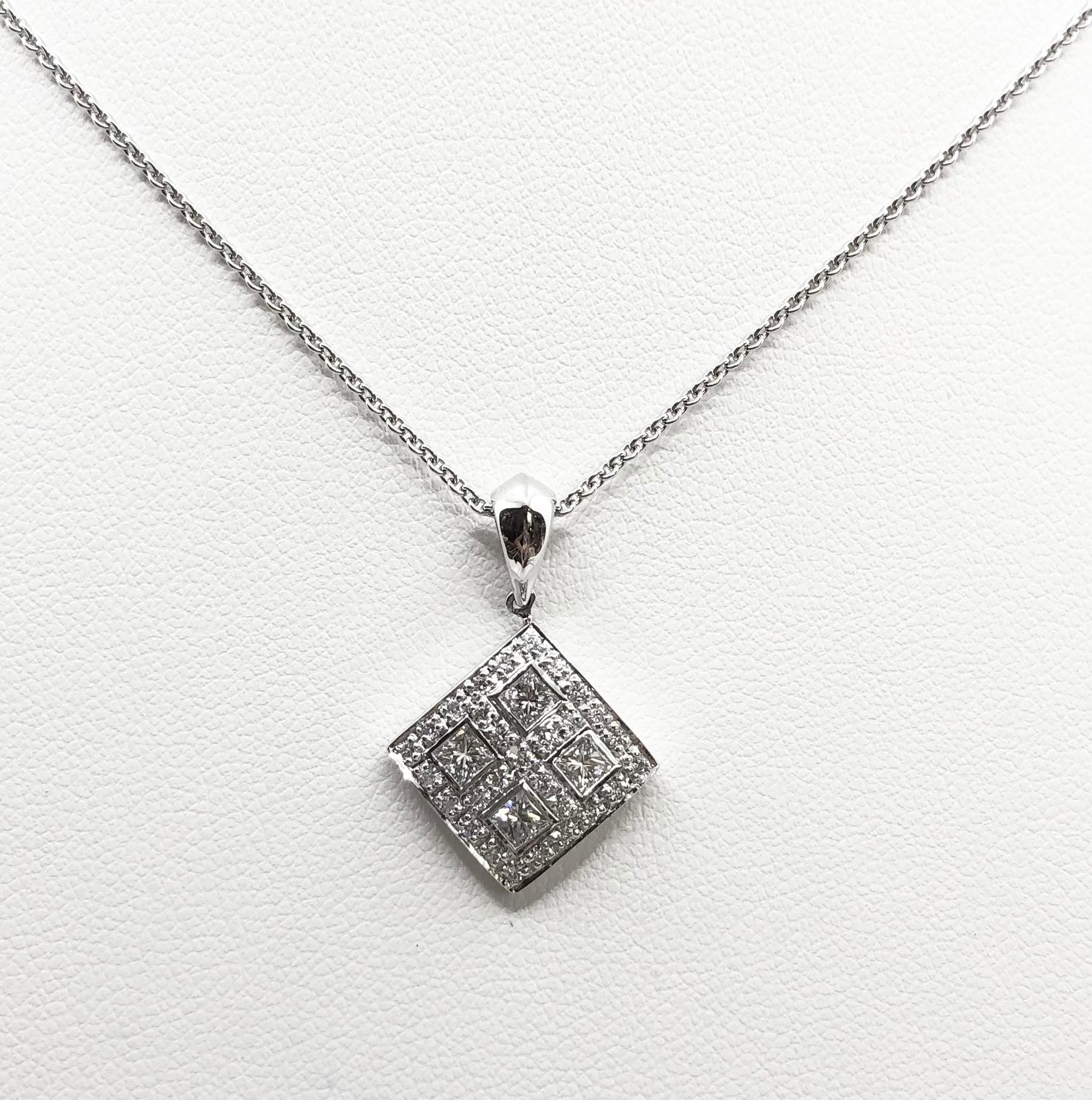 Diamond 0.67 carat Pendant set in 18 Karat White Gold Settings
(chain not included)

Width: 1.6 cm 
Length: 2.5 cm
Total Weight: 2.73 grams


