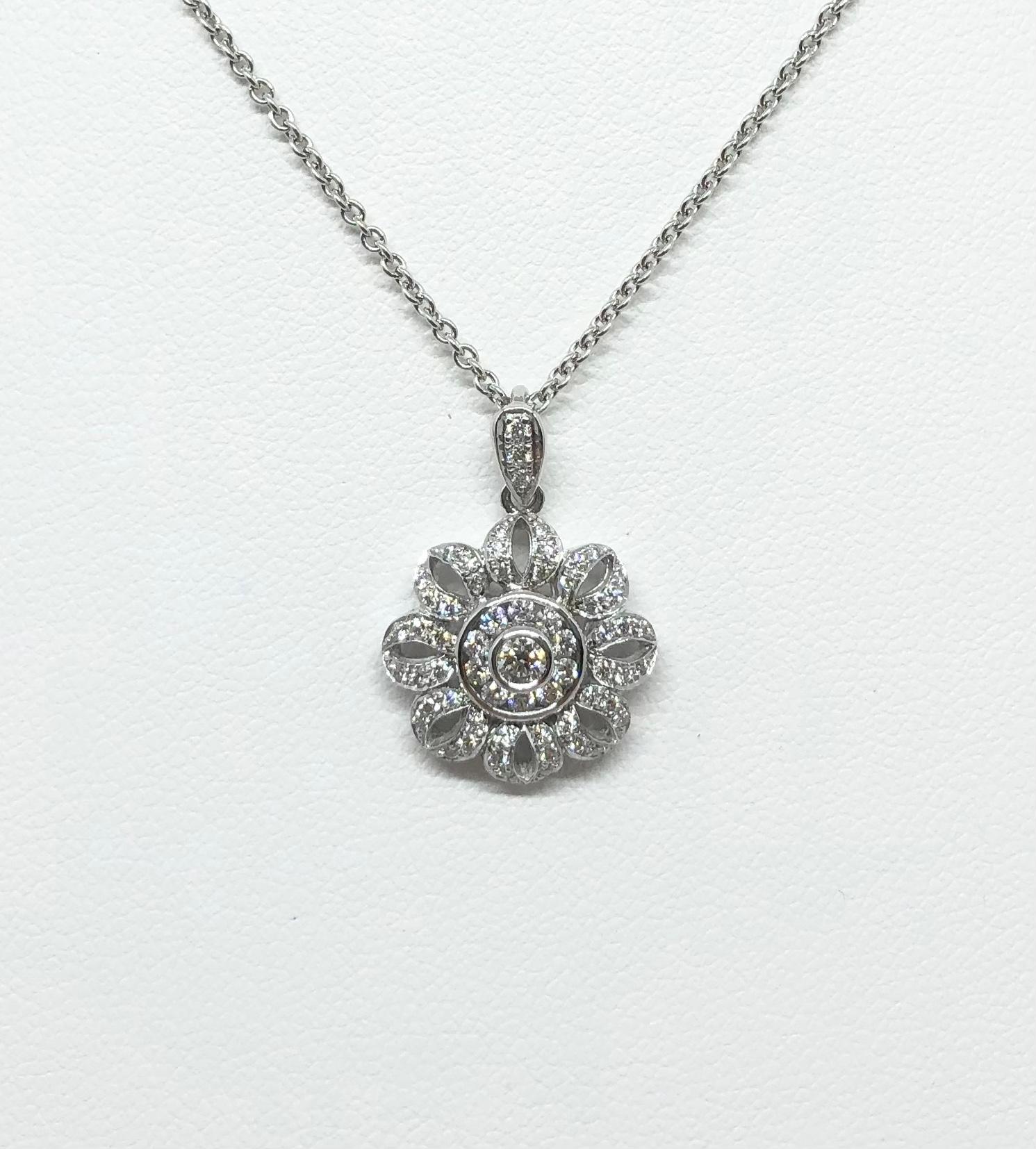 Diamond 0.34 carat Pendant set in 18 Karat White Gold Settings
(chain not included)

Width: 1.3 cm 
Length: 2.0 cm
Total Weight: 2.03 grams

