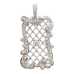 Ciondolo con diamante incastonato in oro bianco 18 carati