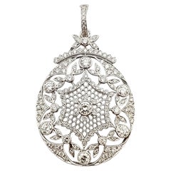 Ciondolo con diamante incastonato in oro bianco 18 carati