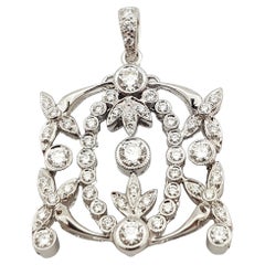 Ciondolo con diamante incastonato in oro bianco 18 carati