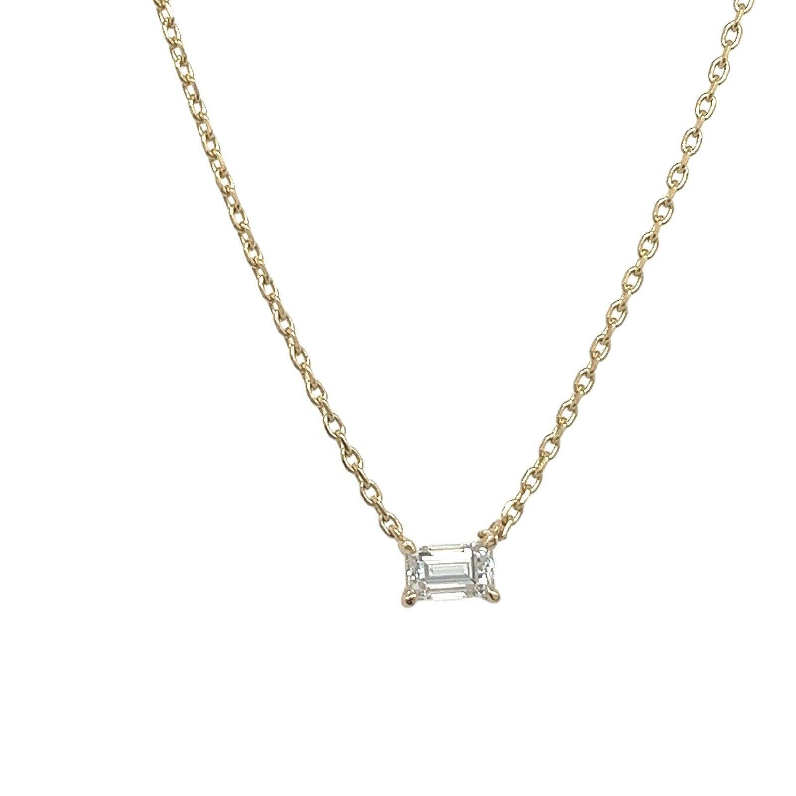 The necklace chain is designed to hold the pendant at the center of the chest, set with 1 emerald cut diamond 0.69ct I/SI1 EDR certified making it a very elegant and beautiful piece of jewellery. 

Additional Information:
Total Diamond Weight: