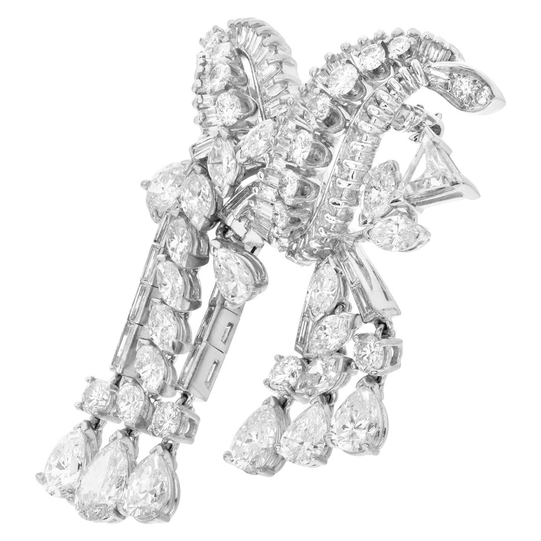 ESTIMATED RETAIL $34,200.00 - YOUR PRICE $15,480.00 - Diamond pin/brooch in platinum with approximately 8.40 carats in round, pear, marquise, brilliant, and baguette G-H color, VS-SI clarity diamonds. Width 40mm. Length 46mm.