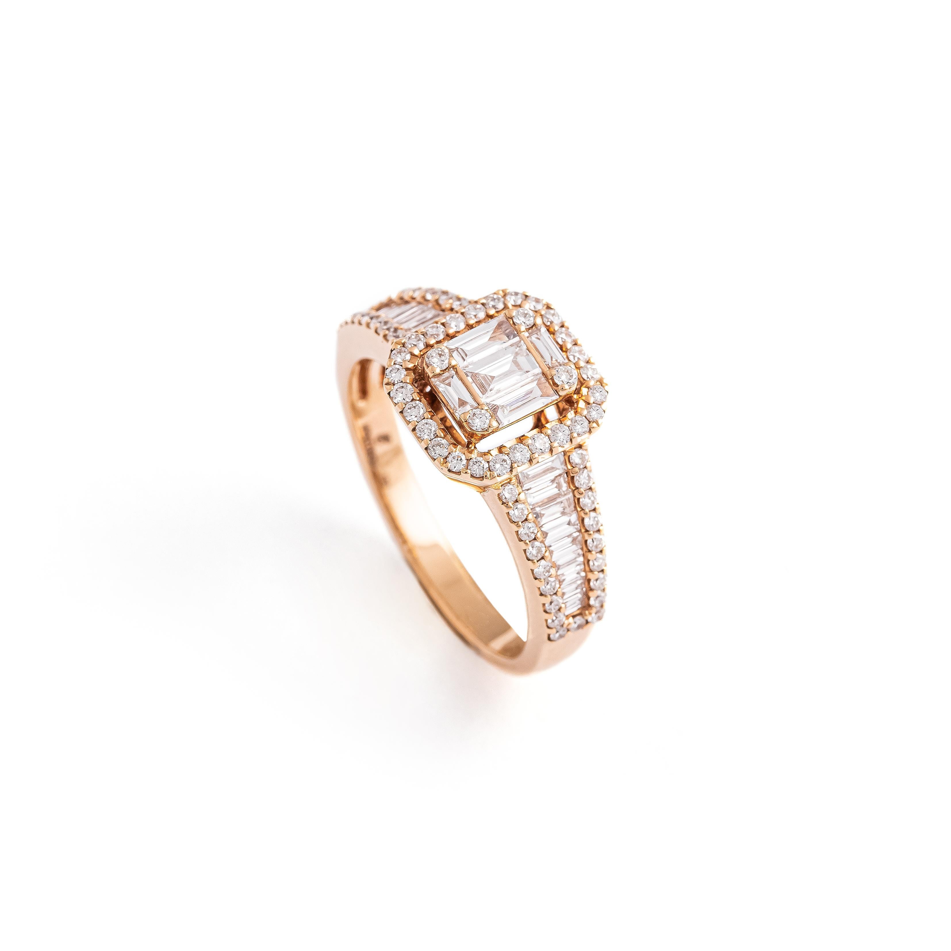 Ring in 18kt pink gold set with 23 baguette cut diamonds 0.55 cts and 68 diamonds 0.40 cts Size 54

Total weight: 5.45 grams