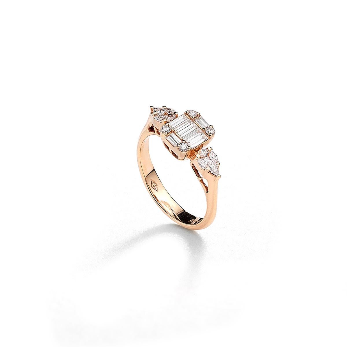 Ring in 18kt pink gold set with 20 princess, marquise, pear shaped and baguette cut diamonds 0.48 cts and 4 diamonds 0.08 cts Size 53

Total weight: 4.15 grams