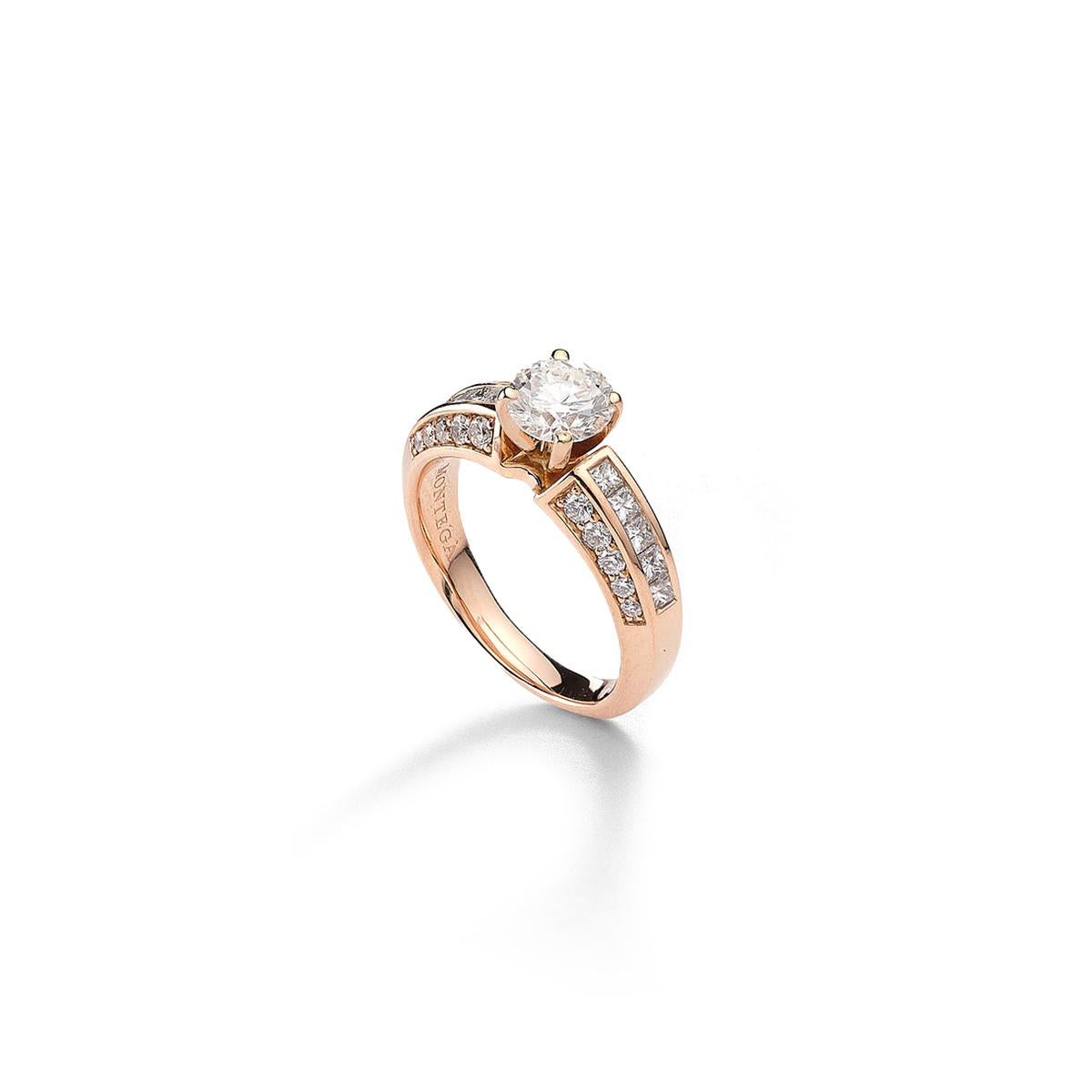 Ring in 18kt pink gold set with one diamond 1.01 cts H VS1, 10 square cut diamonds 0.50 cts and 20 diamonds 0.39 cts GIA Certificate Size 53               