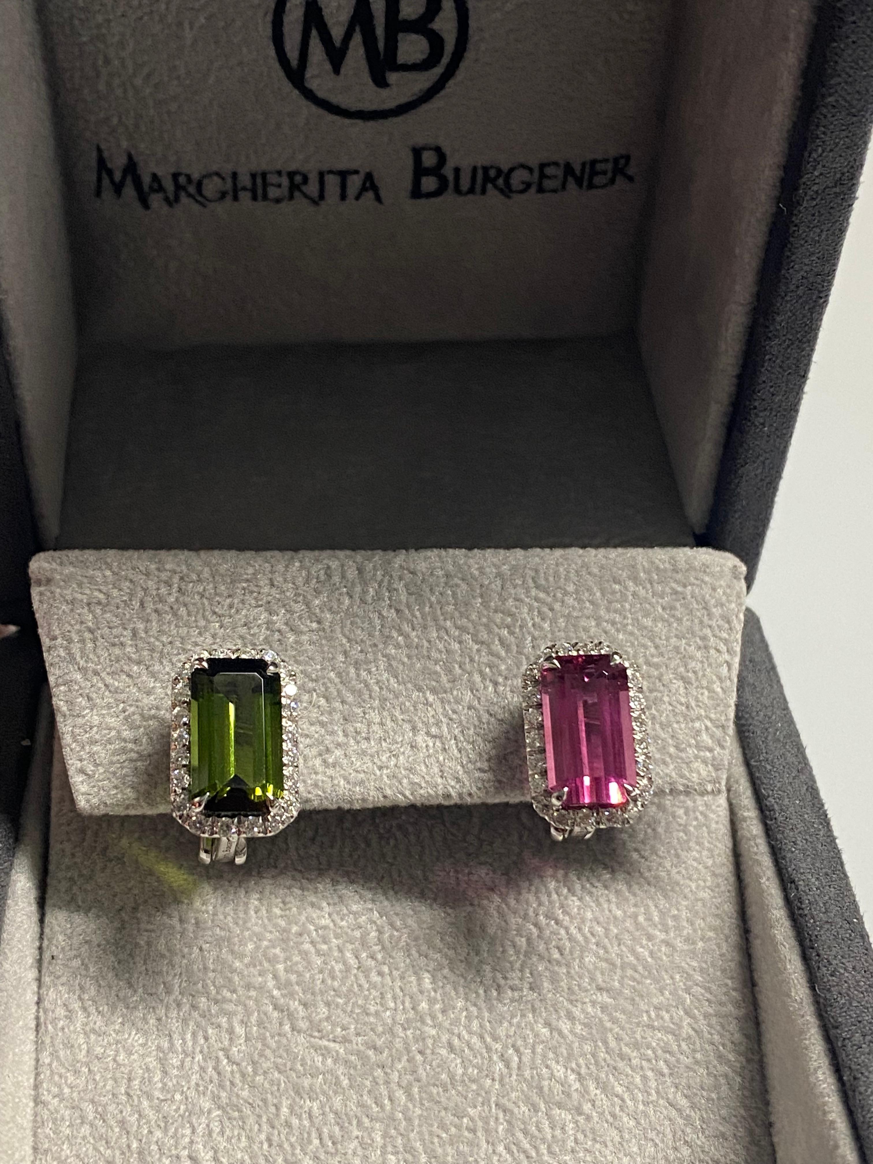 Mismatching pair of lobe earrings, handmade in Italy, featuring two twins tourmaline, one is green and the other one is intense pink color.
All around the stones we set a line of beautiful diamonds.
Clips and fittings . Fittings can be removed for