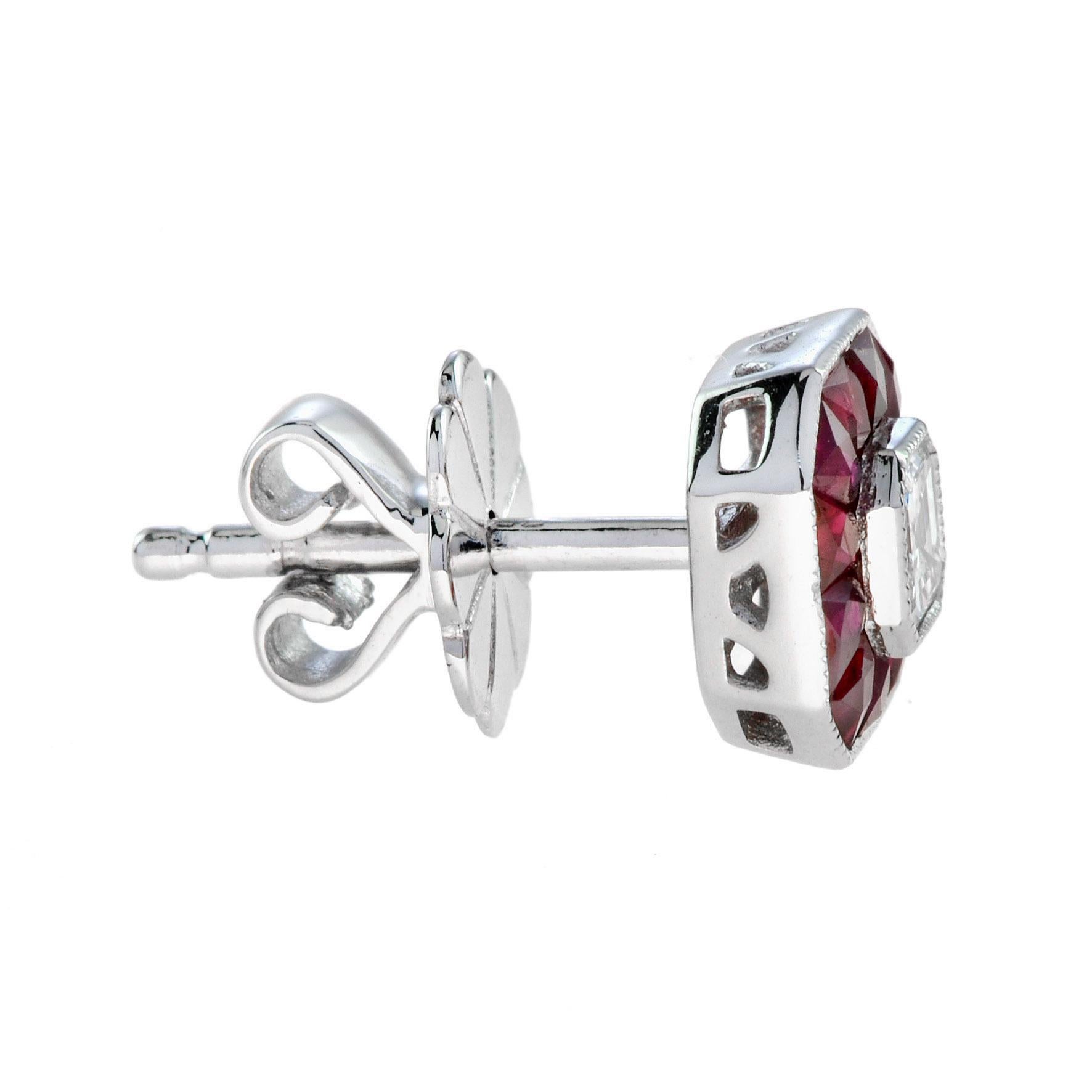 These Art-Deco stud earrings are completely spectacular! The vibrant color stone is a specialty cut to surround the excellent emerald cut center diamond, which is in a thin bezel with millgrain detail. 14K White Gold. 
Information
Style: Art