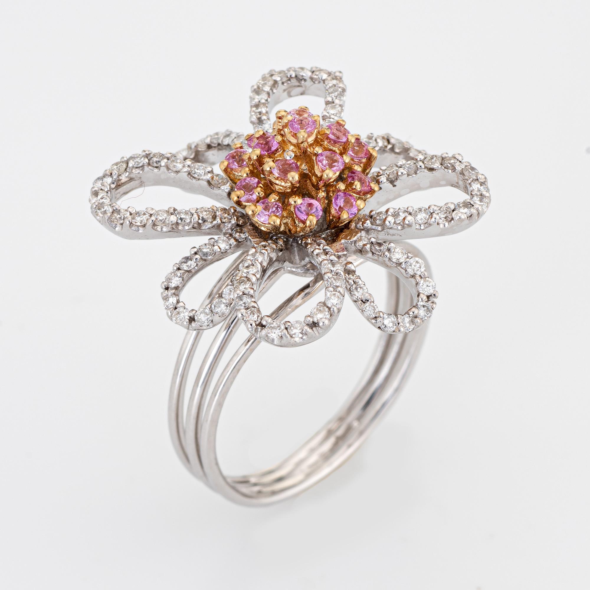 Stylish contemporary diamond & pink topaz flower ring crafted in 14 karat white gold. 

Pink topaz totals an estimated 0.37 carats. Diamonds total an estimated 0.72 carats (estimated at H-I color and SI1-I2 clarity). 

Diamonds adorns the petals,