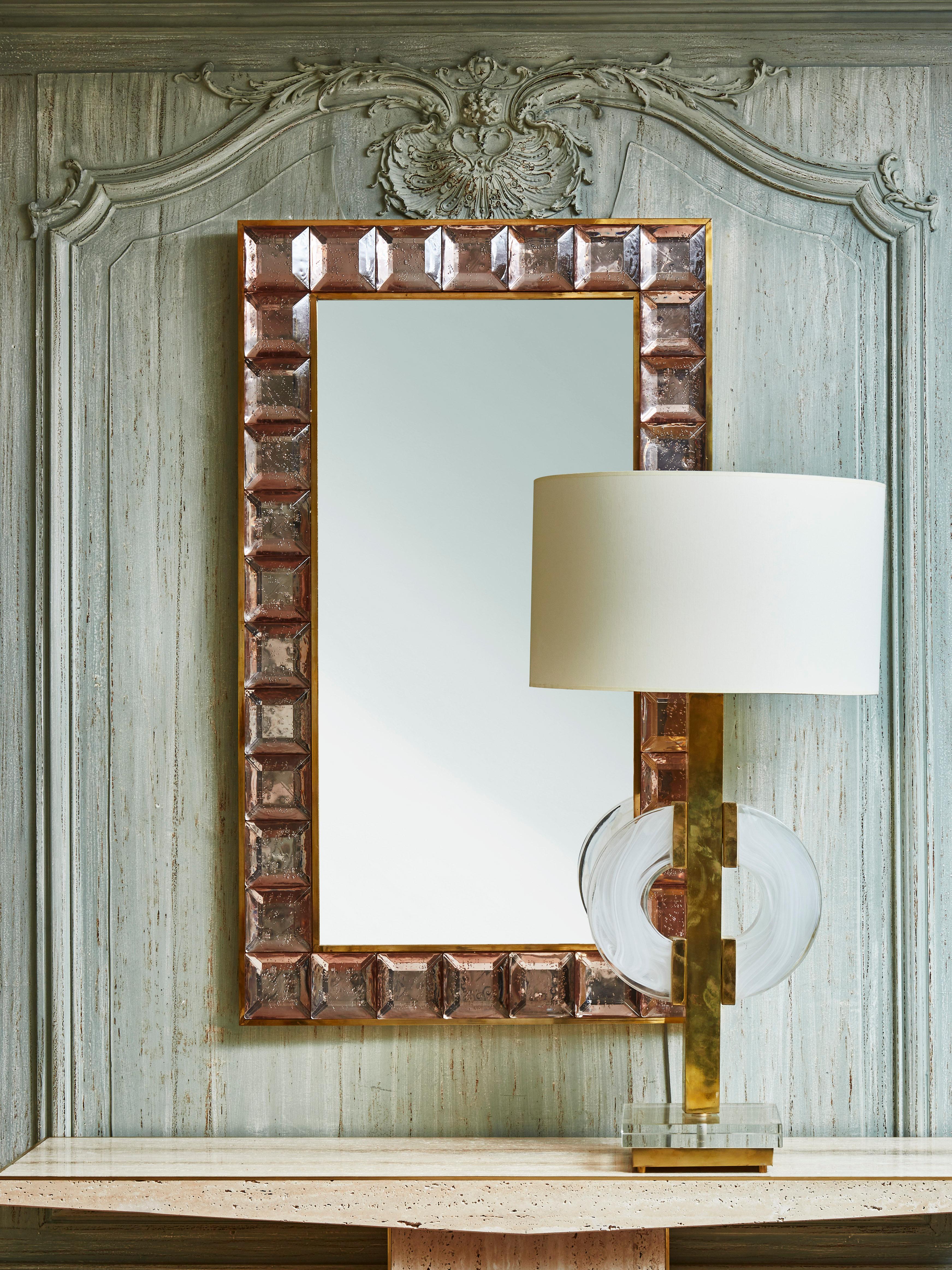 Brass mirror with frame in pink 