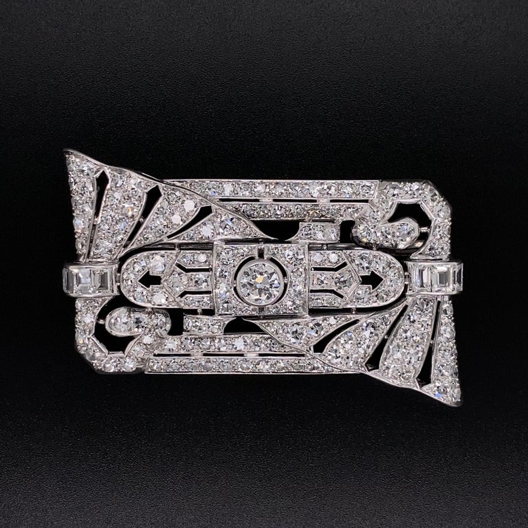 Simply Beautiful! Finely detailed Art Deco Diamond Rectangular Platinum Brooch. Beautifully Hand crafted in Platinum and Hand set with Diamonds approx. 8.32 total Carat weight. Measuring approx. 2.20” long x 1.5” wide. The Brooch is in excellent