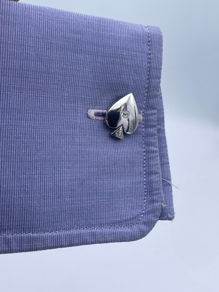 Figural card suit double sided cufflinks. Platinum set with full cut diamonds.Well executed. Clean beautiful look. A perfect gift for the shark in your life.

Alice Kwartler has sold the finest antique gold and diamond jewelry and silver for over