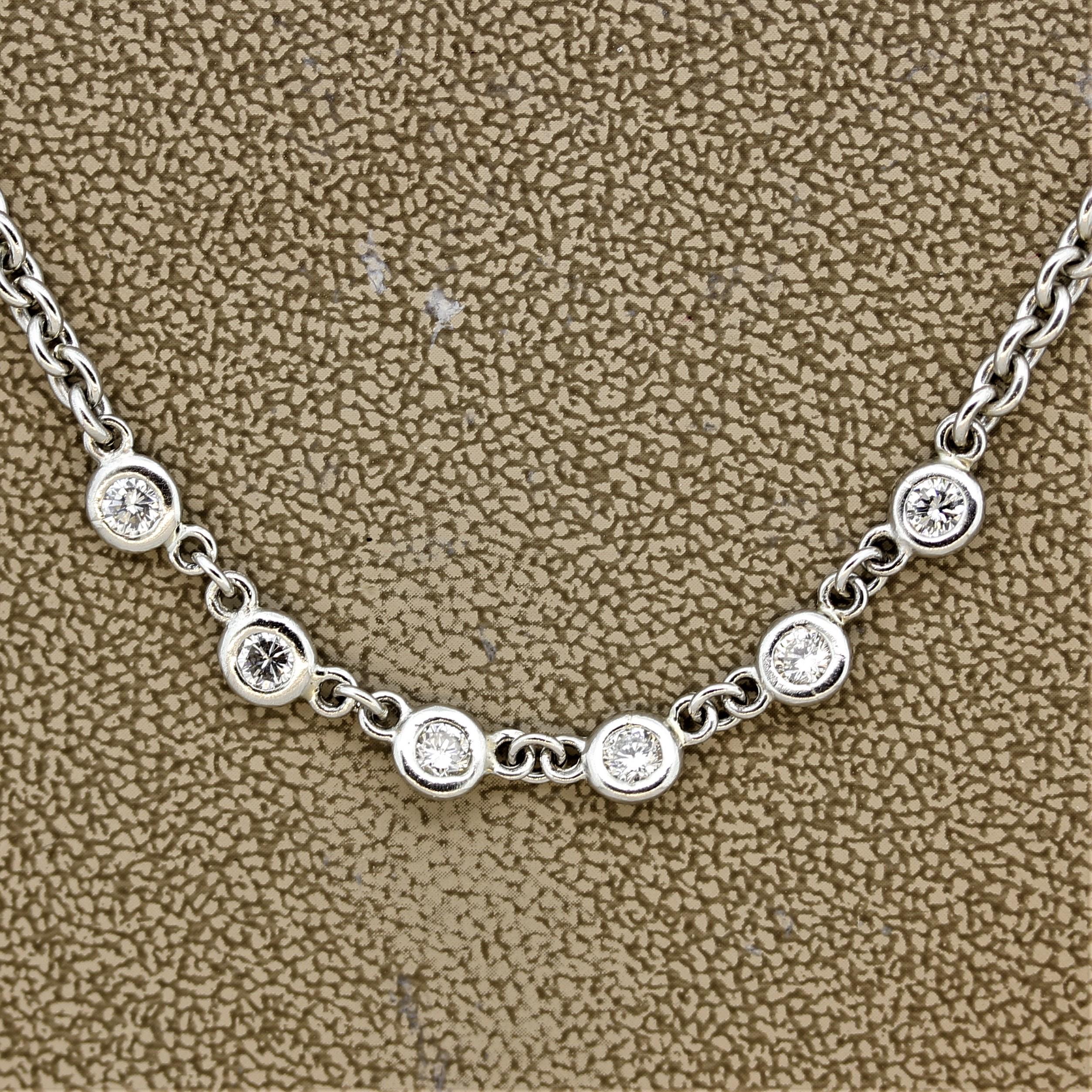 A sweet 16-inch necklace featuring 6 fine round brilliant cut diamonds. Each diamond is bezel set and weighs about 0.11 carats each, totaling 0.68 carats between them all. Hand-fabricated in platinum.

Length: 16 inches