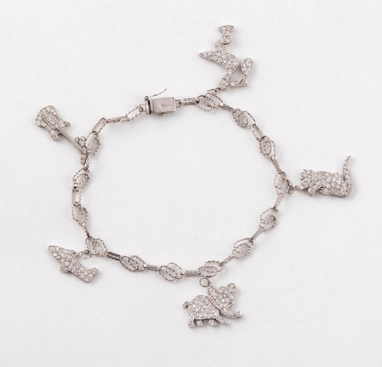 Diamond Platinum Charm Novelty Bracelet at 1stDibs novelty bracelets
