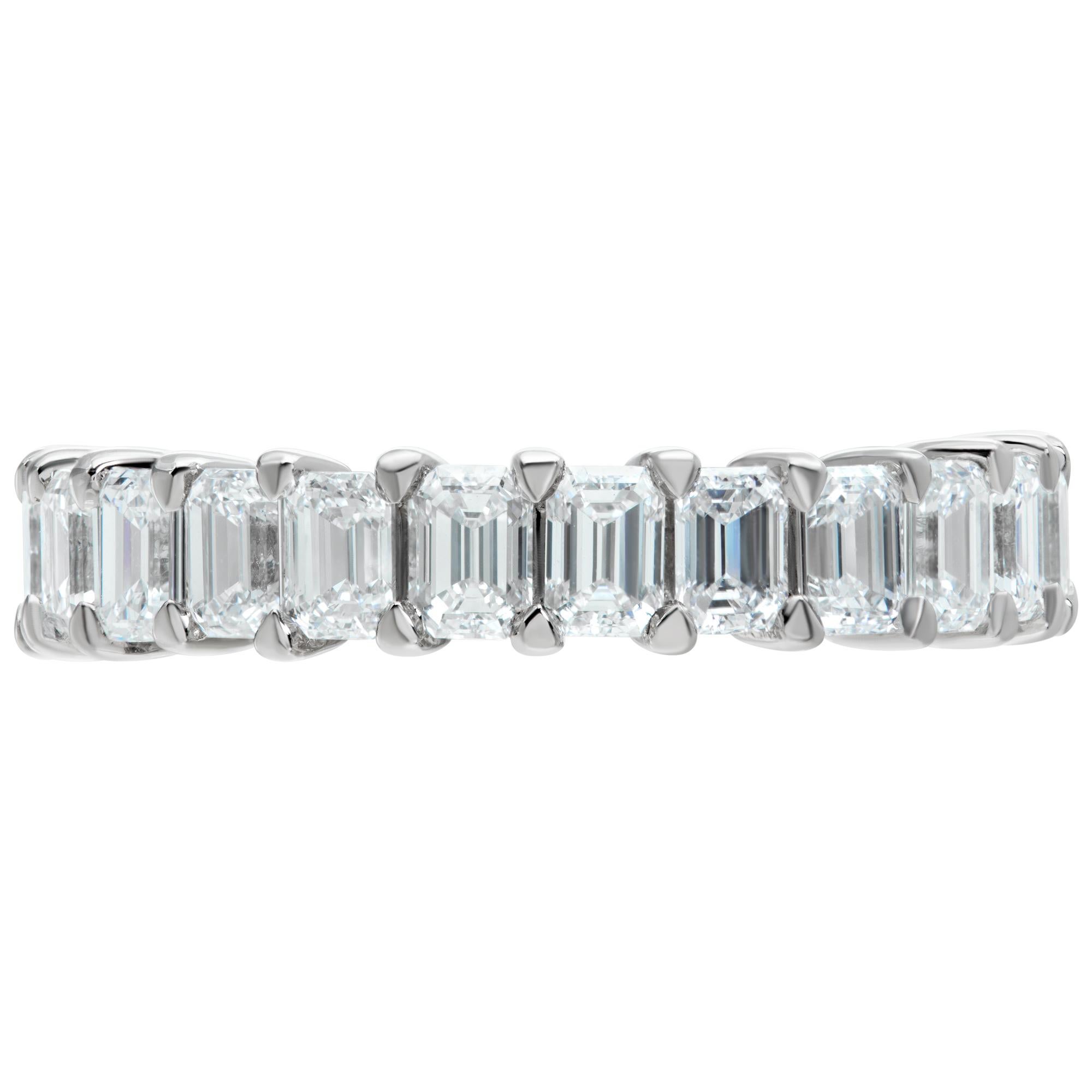 Platinum diamond eternity band with 3.61 carats in G-H color, VS clarity emerald cut diamonds. Size 6.5