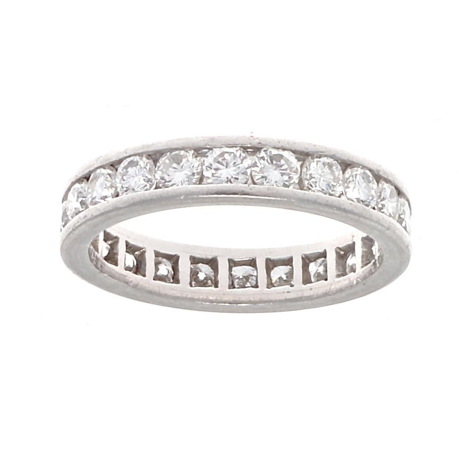 A timeless elegance radiates from this diamond platinum eternity ring. Featuring 22 round cut diamonds orbiting the platinum ring weighing 1.10 carats and are F color, VS1 clarity. Crafted in platinum.

Ring size 5 1/4.
