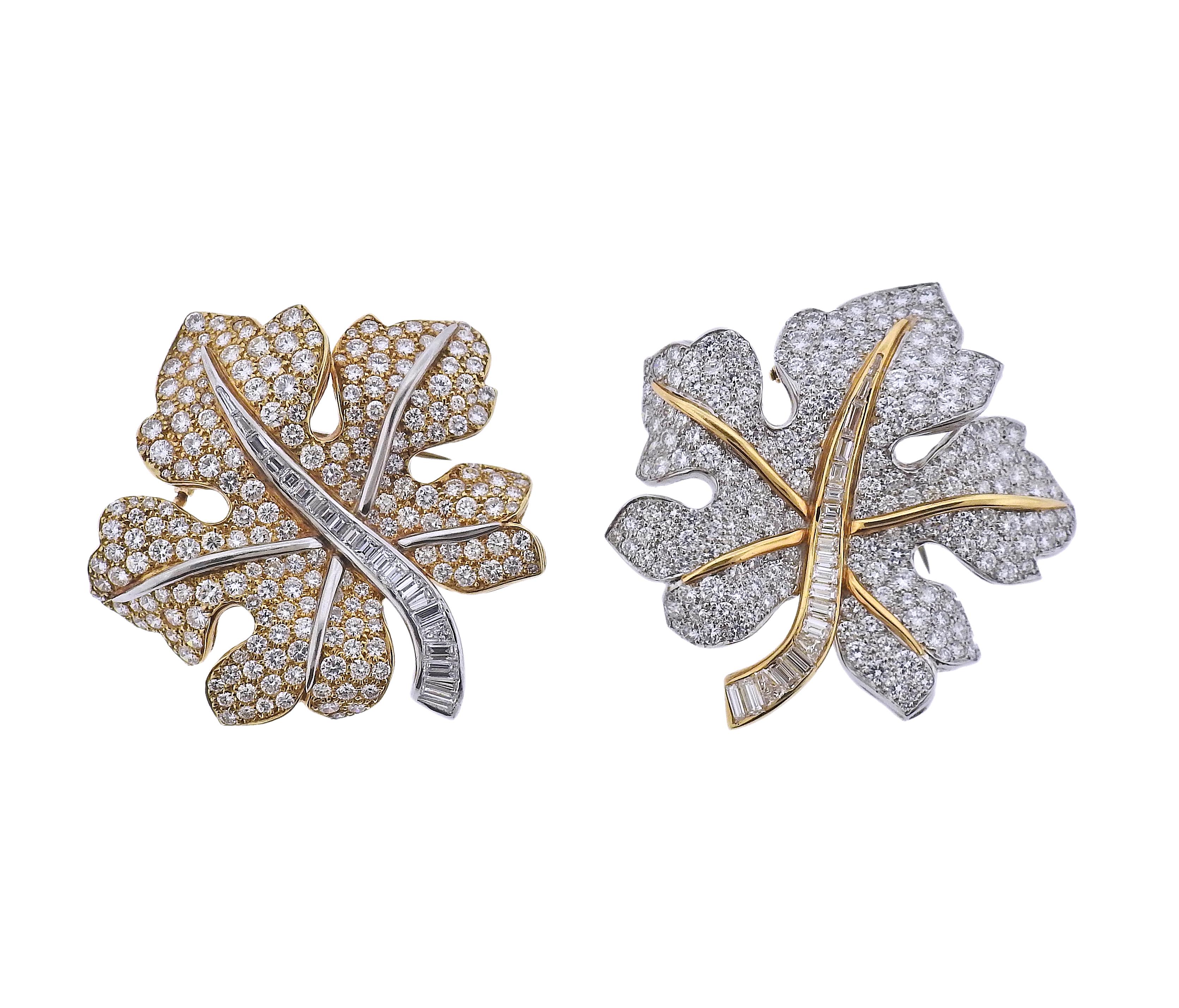 Set of two large leaf brooches, in 18k gold and platinum, set with a total of approx. 12 carats in diamonds. Brooches measure 2