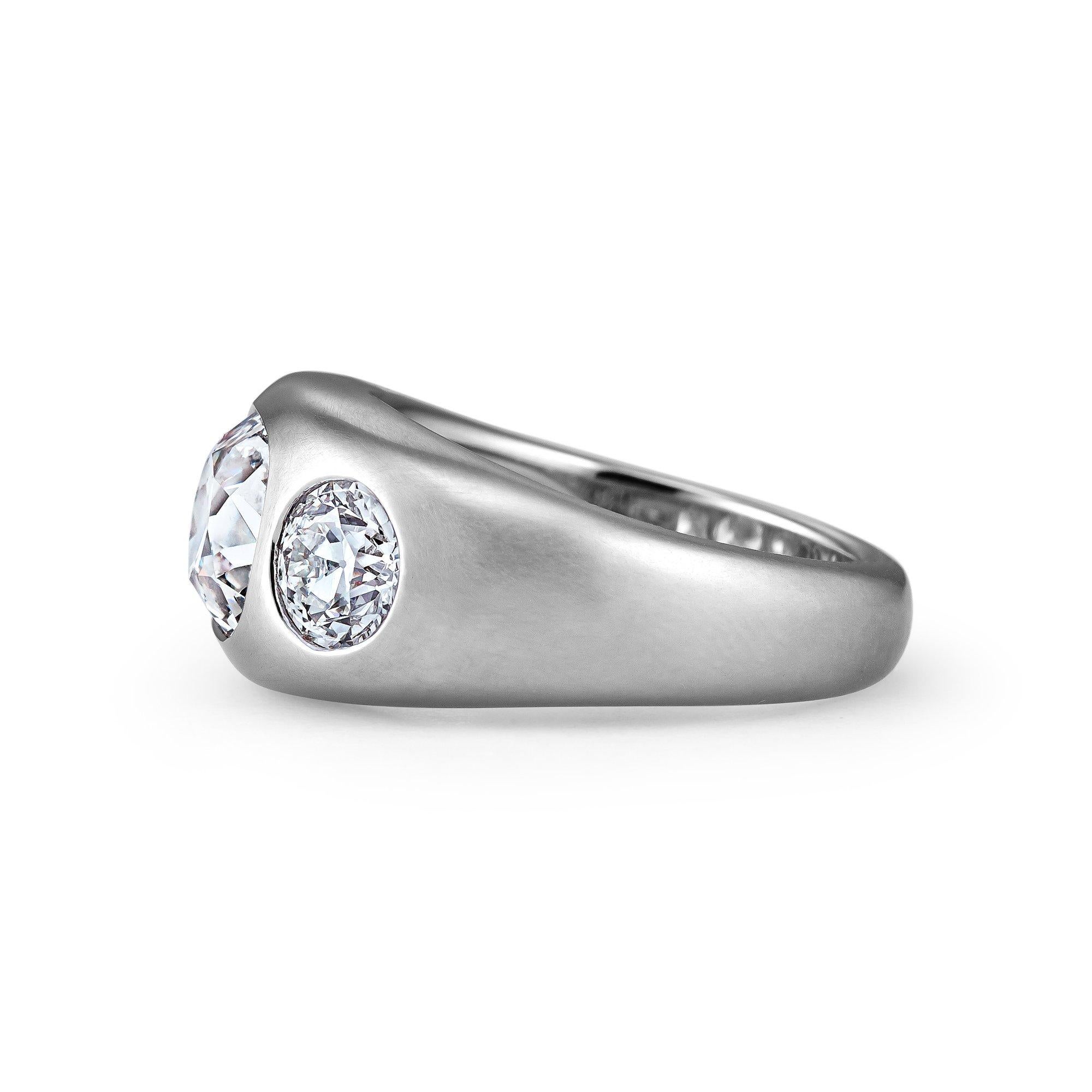 Popular in the Victorian era, the gypsy band ring symbolized eternal friendship and love.  With three diamonds set flush with the surface of this domed gypsy platinum setting, this handmade band is the modern version of eternal commitment.  Whether