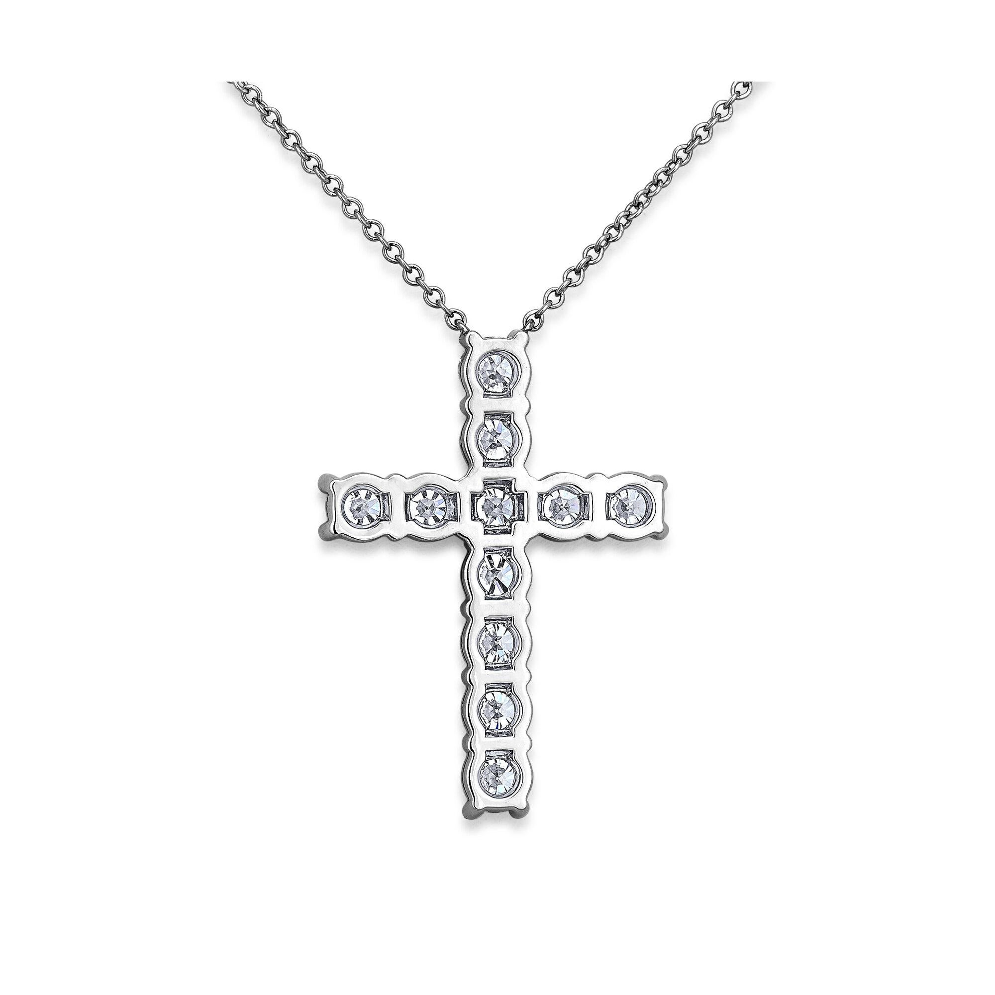 This sparkling diamond platinum handmade cross necklace will become a family heirloom that will always be worn close to the heart.  11 ideal cut  round brilliant diamonds with a total weight of 1.85 carats.  D-F color.  VVS1-2 clarity.  16