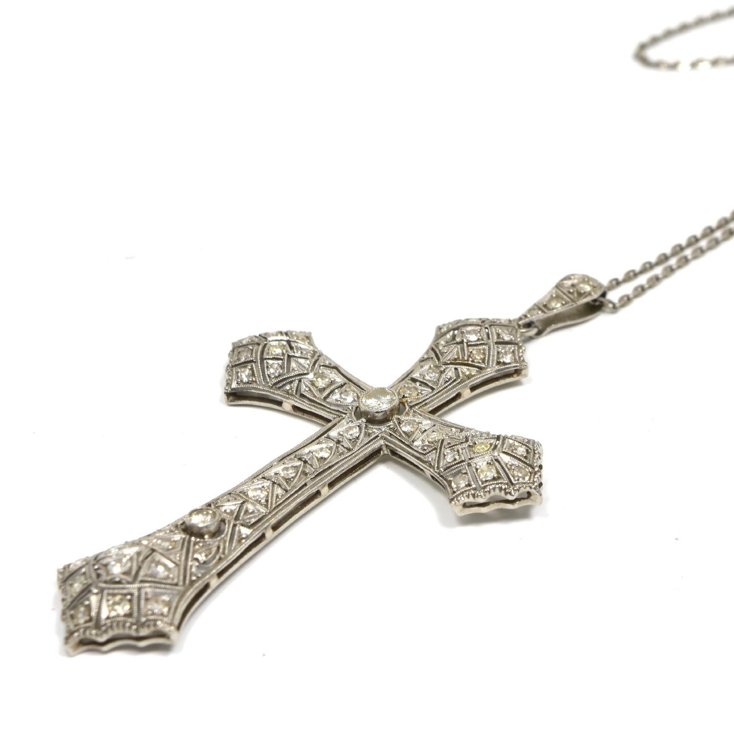 Theme: Cross

​​​​​​​Metal: Platinum

Metal Purity: 950

Stones: Round Brilliant Cut Diamonds

Total Carat Weight:  Approx. 1.53 ct

Total Item Weight (g): 10.7 g

Necklace Length: 18 inches

Cross Dimensions: approx. 4 x 6 cm