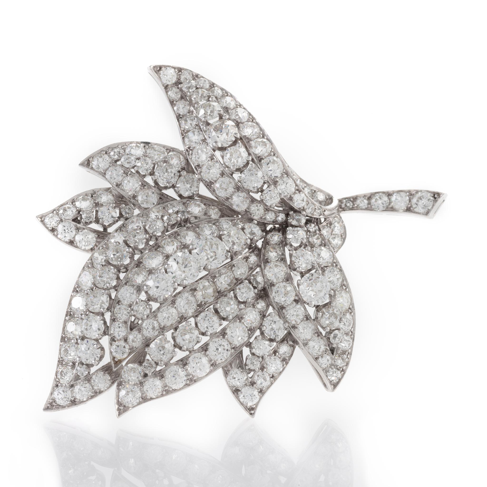 Thoughtfully-observed naturalism heightens the striking beauty of this Art Deco diamond leaf brooch, set in platinum. The sculptural modeling of the leaves and their asymmetrical, layered placement are wonderfully lifelike–the variation in diamond