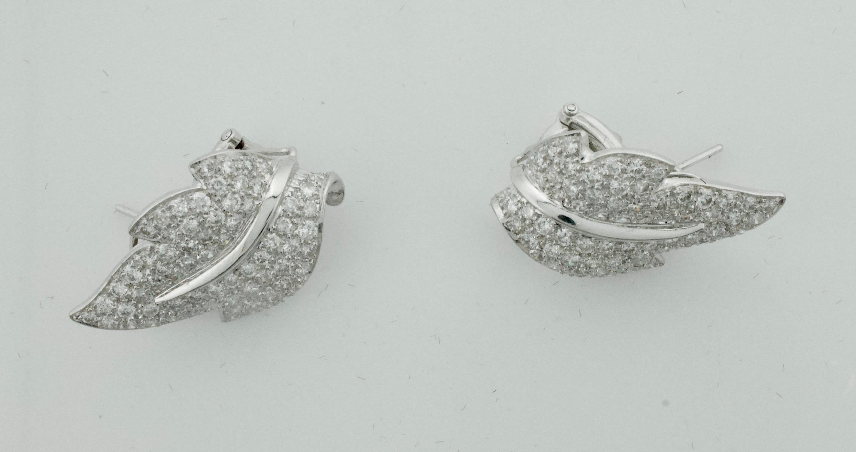 Diamond Platinum Leaf Earrings  4.00 carats
One Hundred and Fifty Round Brilliant Cut Diamonds weighing 4.00 carats approximately [GH VVS-VS1]
Very Fine Quality