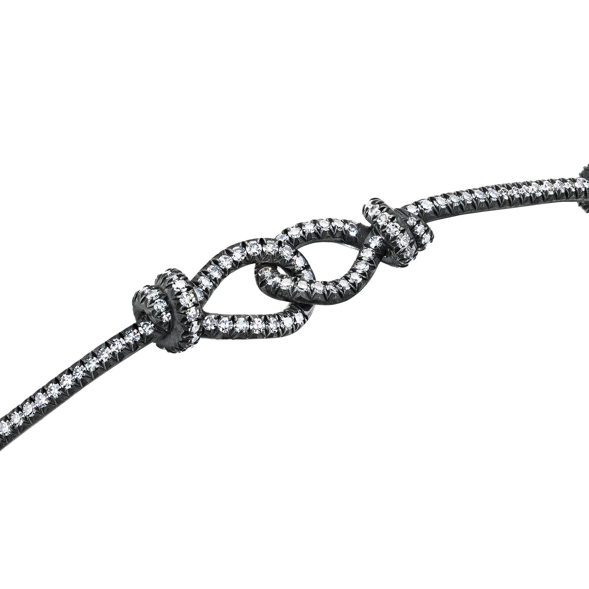 Contemporary Diamond Platinum Love Knot Bracelet
