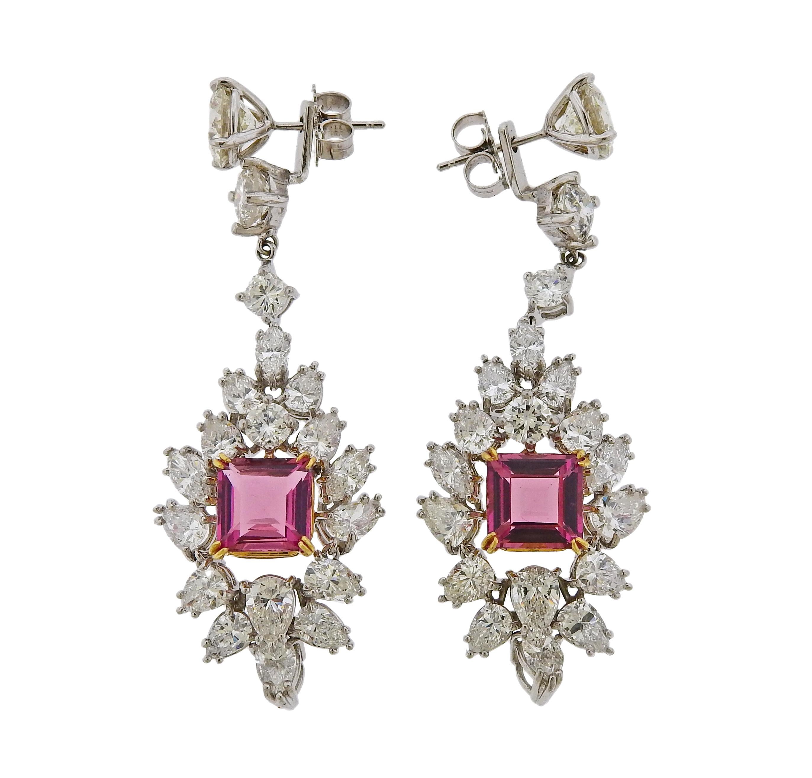 Pair of exquisite platinum long drop earrings, convertible to studs. The earrings are set with a total of approx. 9.50ctw in diamonds (two largest stud diamonds are approx. 2.10ctw) and two square cut pink tourmaline - approx. 3.35ctw, set in 18k