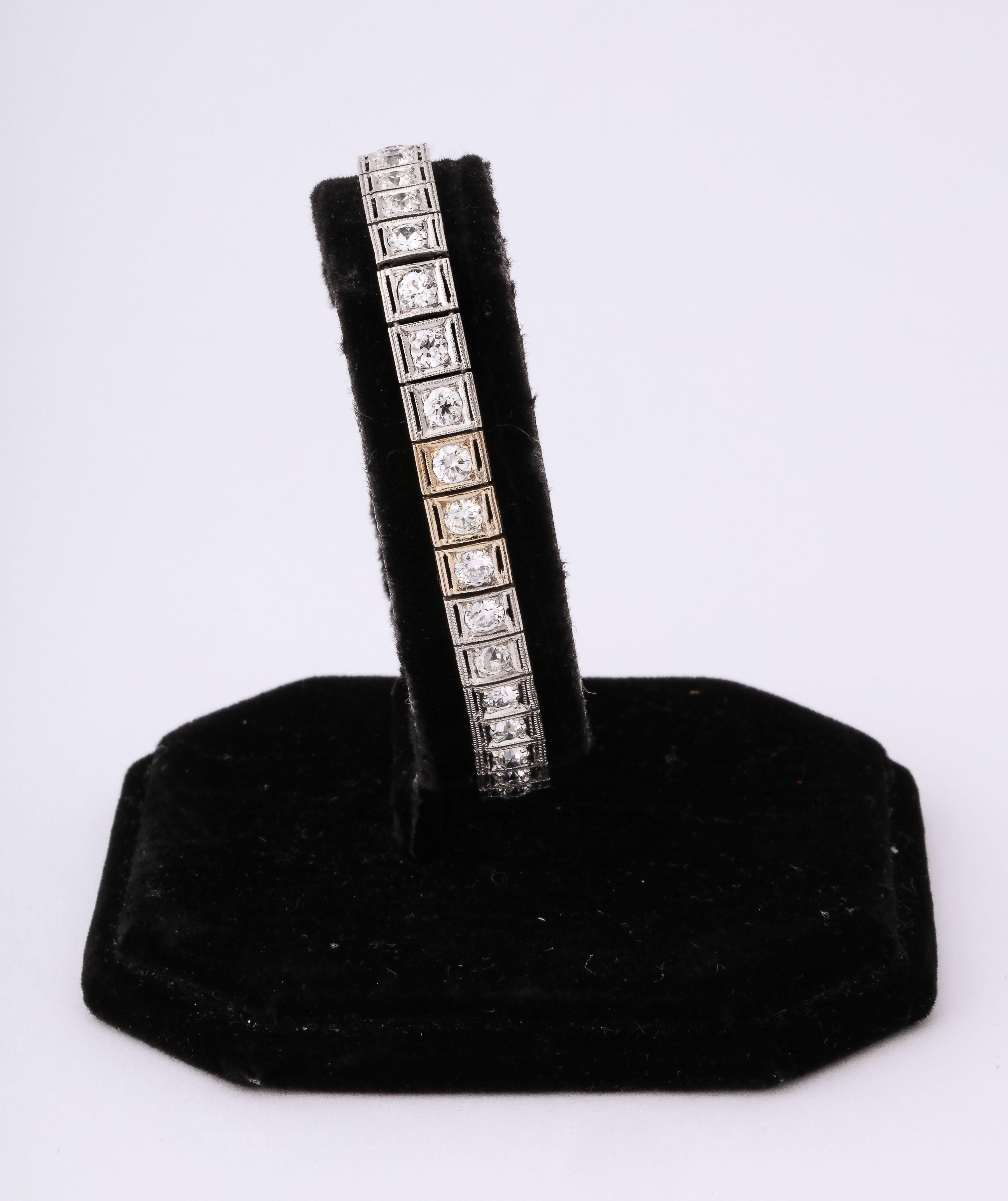 Out with the NEW  & IN with the Old.  Vintage Tennis Bracelet - Prong set in Platinum with pierced border.  38 clean & full cut old european Diamond stones -  totaling almost 6 carats with an  invisible cross over safety bar.  A great look - just