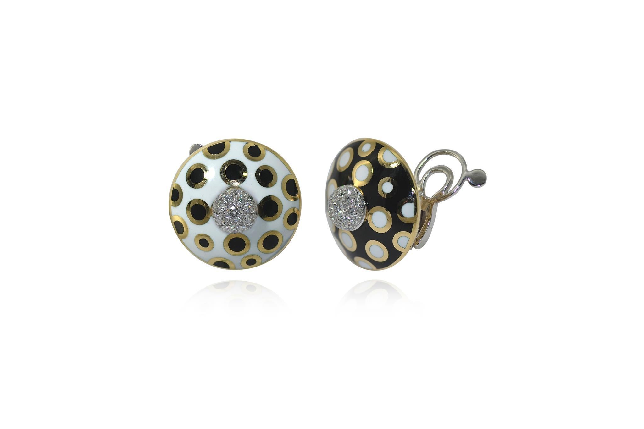 Chic and comfortable, handcrafted in Margherita Burgener family workshop, based in Valenza - Italy,  the black and white enamel earclips, are detailed by a bombé diamonds pavé set central button. 
Polka dot motif is black and white and white and