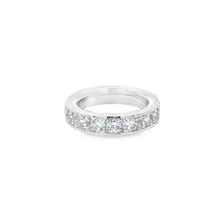 We are excited to announce the arrival of our new 14K White Gold halfway diamond band. This exquisite piece boasts nine princesses cut diamonds with a total of 3.42 carats, H color, and VS clarity, which give off a stunning radiance and add a touch