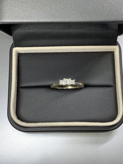 Diamond princess cut trilogy engagement ring 18ct white gold