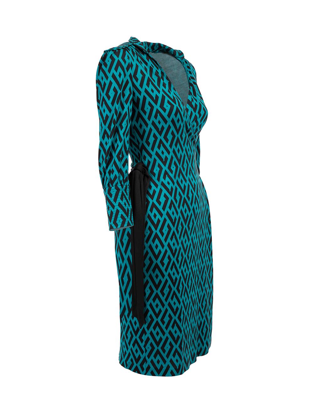 CONDITION is Very good. Hardly any visible wear to dress is evident on this used Diane Von Furstenberg designer resale item.



Details


Teal and black 

Silk

Wrap dress

Abstract diamond print

Mini length

3/4 Length sleeves





Made in