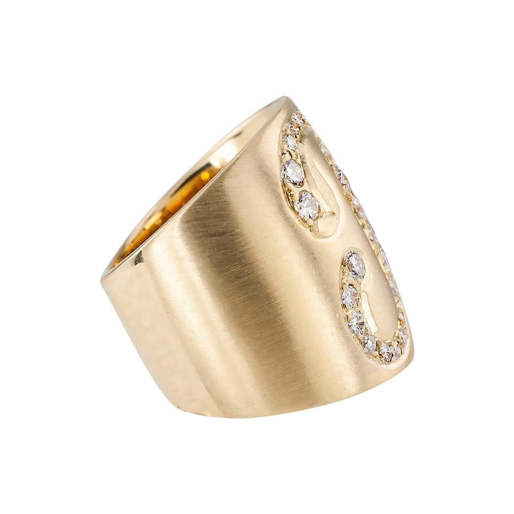 Diamond and yellow gold R initial cigar band ring circa 1970.  Clear and concise information you want to know is listed below.  Contact us right away if you have additional questions.  We are here to connect you with beautiful and affordable