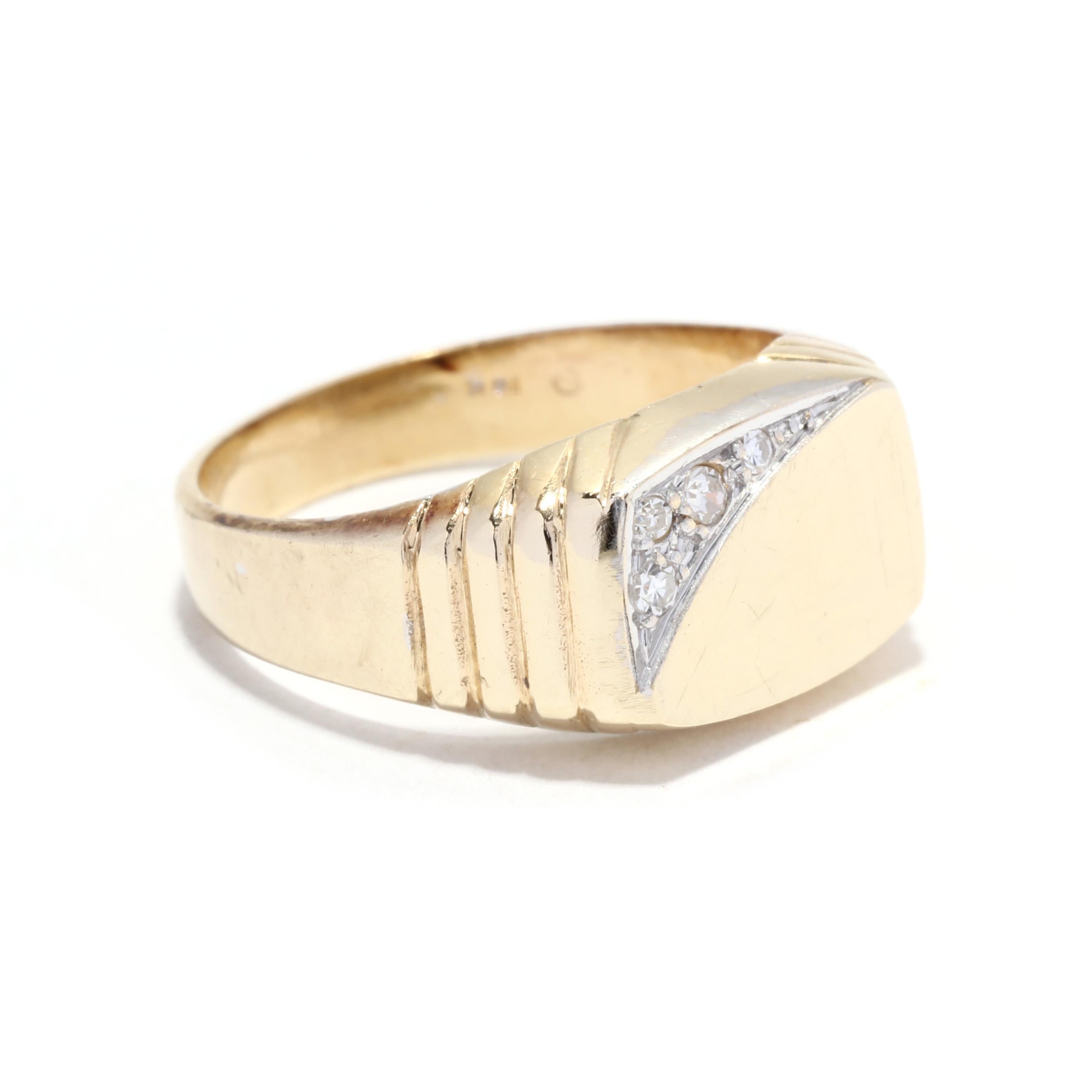 A vintage 14 karat yellow gold diamond rectangle signet ring. This vintage ring features a horizontal rectangle signet face with single cut round diamonds weighing approximately .05 total carats and with a tapered ridged band.

Stones:
- diamonds, 4