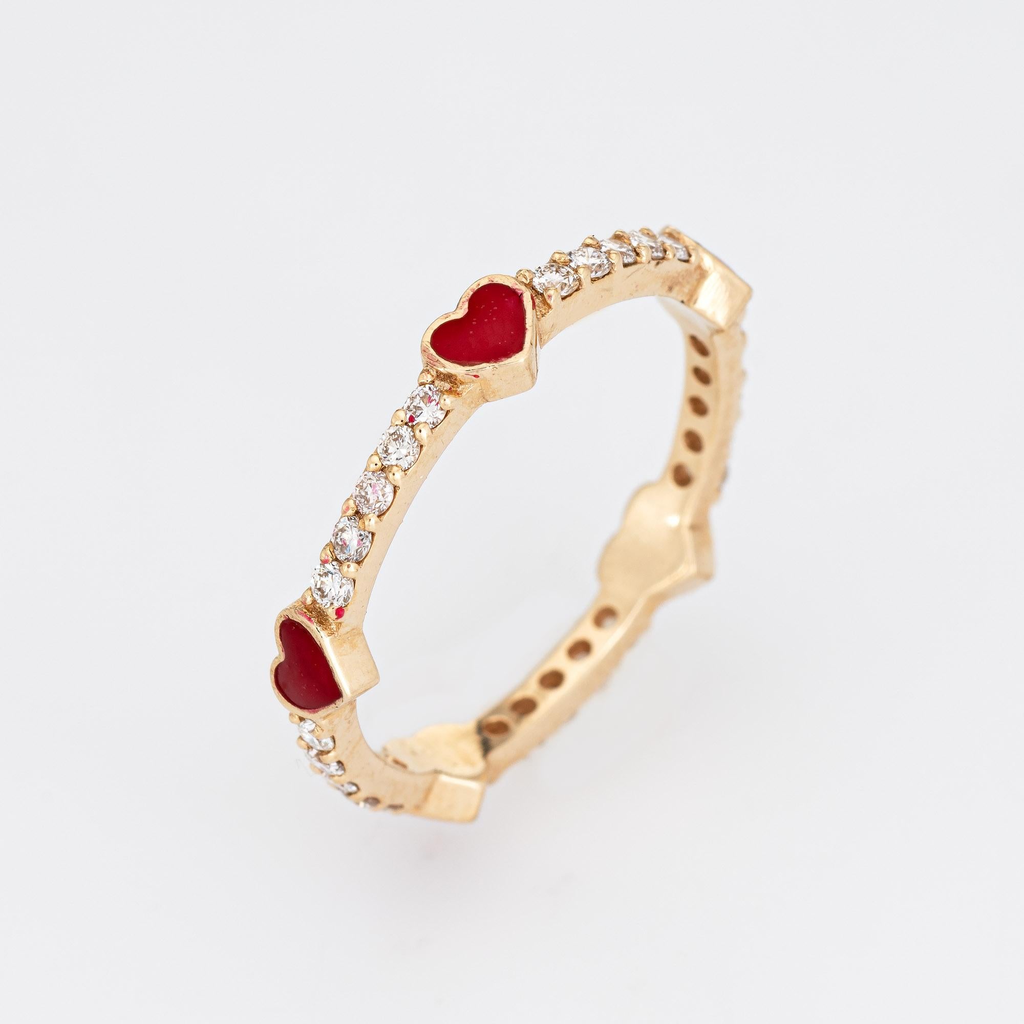 Stylish estate diamond eternity ring crafted in 14 karat yellow gold. 

Diamonds total an estimated 0.50 carats (estimated at H-I color and VS2-SI1 clarity). The red enamel is in excellent condition and free cracks or chips. 

The romantic eternity