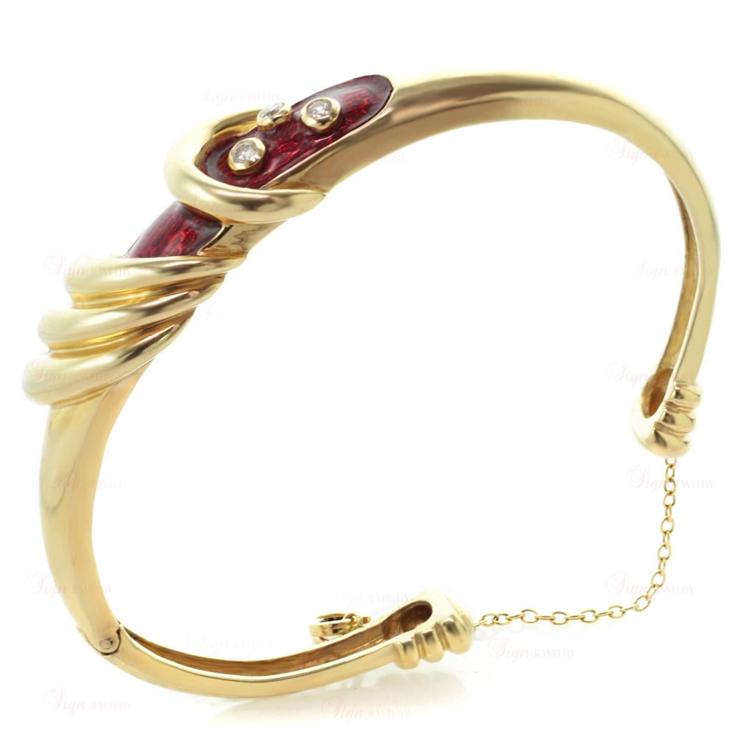 A classic deco inspired bangle made in the 1970s. This bracelet is crafted out of 14k yellow gold and features 3 sparkling diamonds bezel set in red enamel. Measurements: 6.5