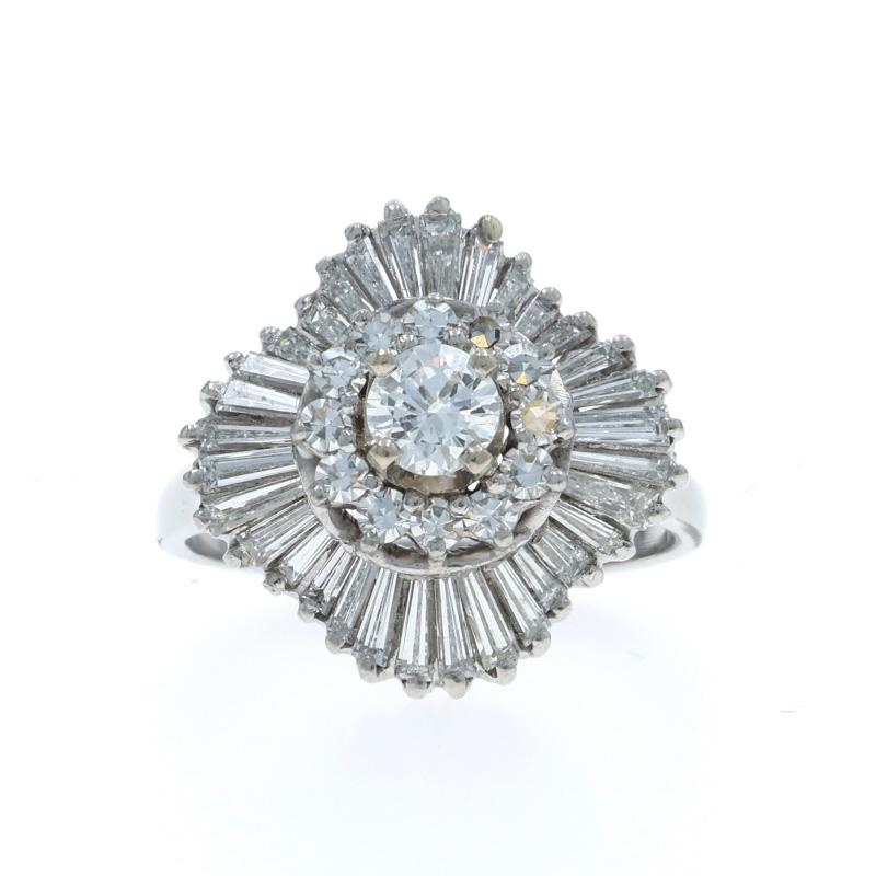 Size: 5 3/4
Sizing Fee: Up 3 sizes for $80 or Down 2 sizes for $60

Design:  Ballerina
Era: Retro

Metal Content: Platinum 950

Stone Information

Natural Diamond
Carat(s): .30ct
Cut: Round Brilliant
Color: G
Clarity: VS2

Natural Diamonds
Carat(s):