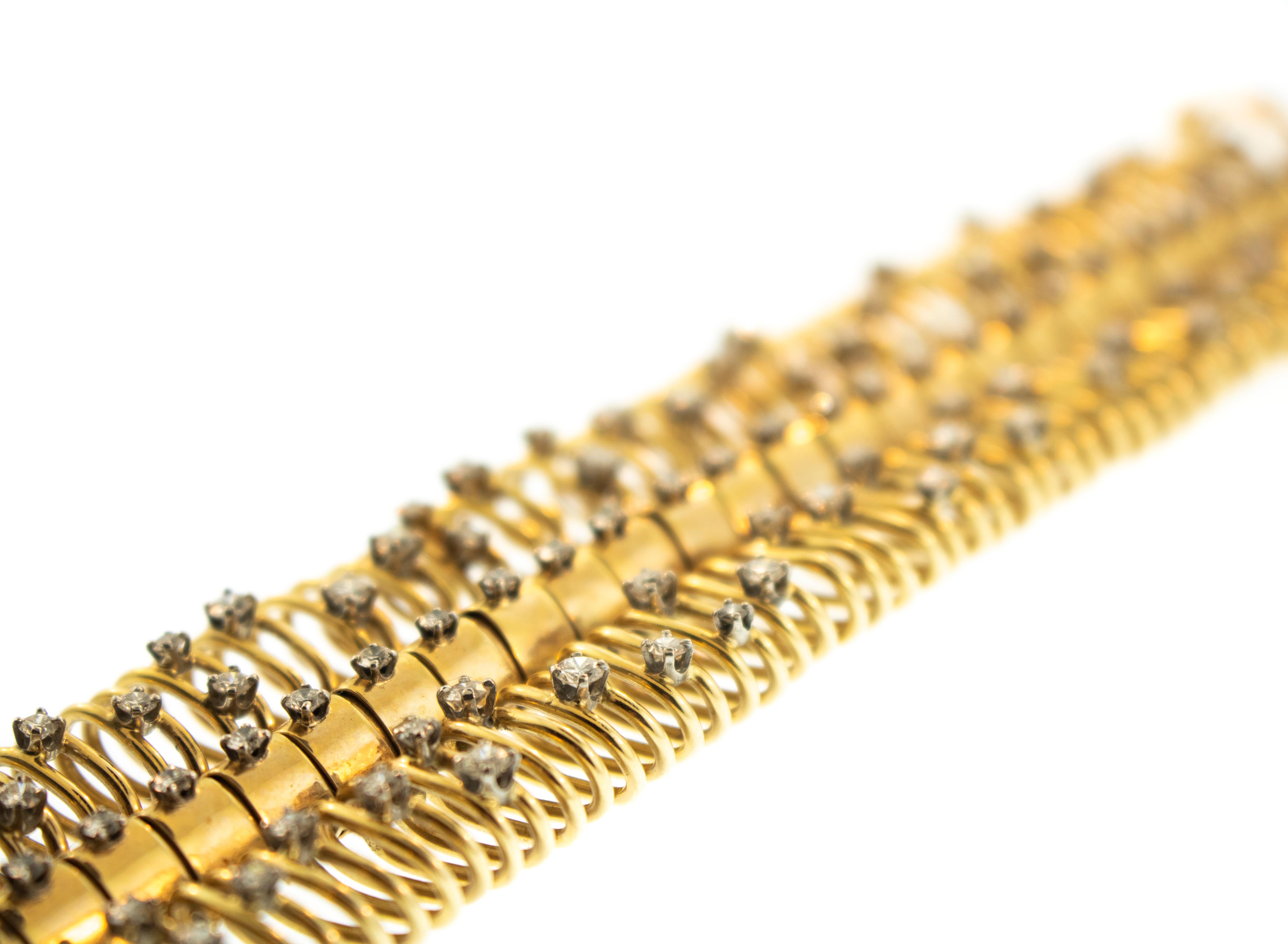 Bracelet rétro à diamants en or 14k. Ce magnifique bracelet flexible est un chef-d'œuvre unique en son genre. Poids total 91,15 grammes. 6.75 pouces de long
