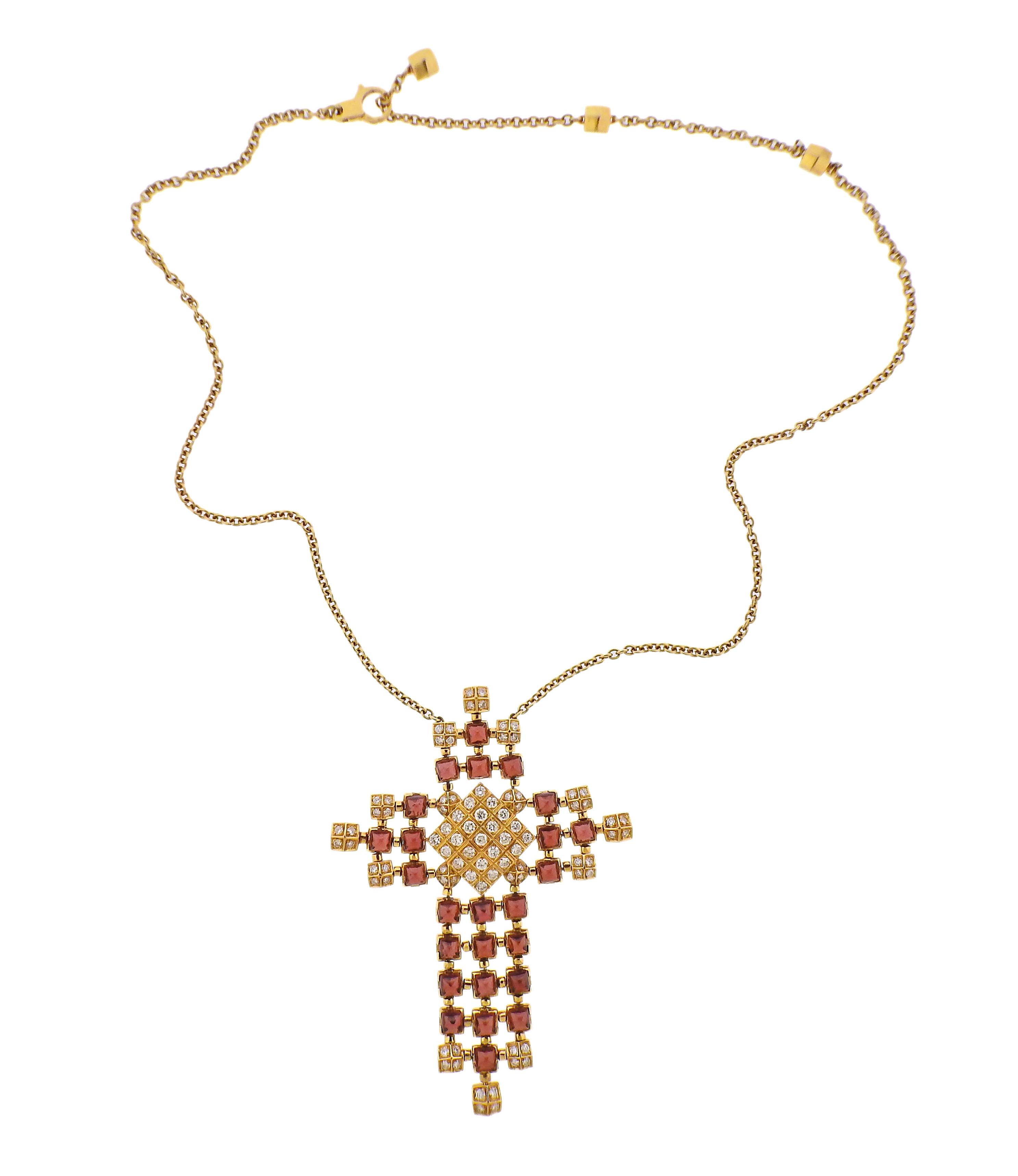 18k gold long chain necklace with large cross pendant, set with sugarloaf cut rhodolite and approx. 2.55ctw in diamonds. Necklace is 20