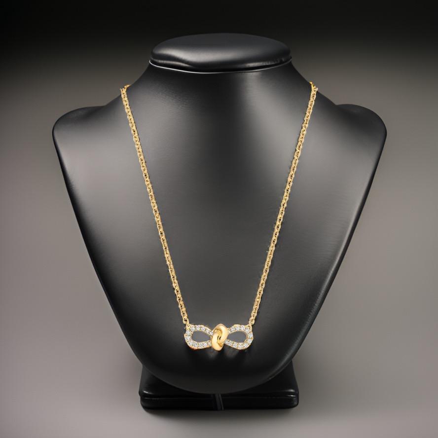 DIAMOND Ribbon Knot BOW NECKLACE IN 18CT Gold In New Condition For Sale In Ilford, GB
