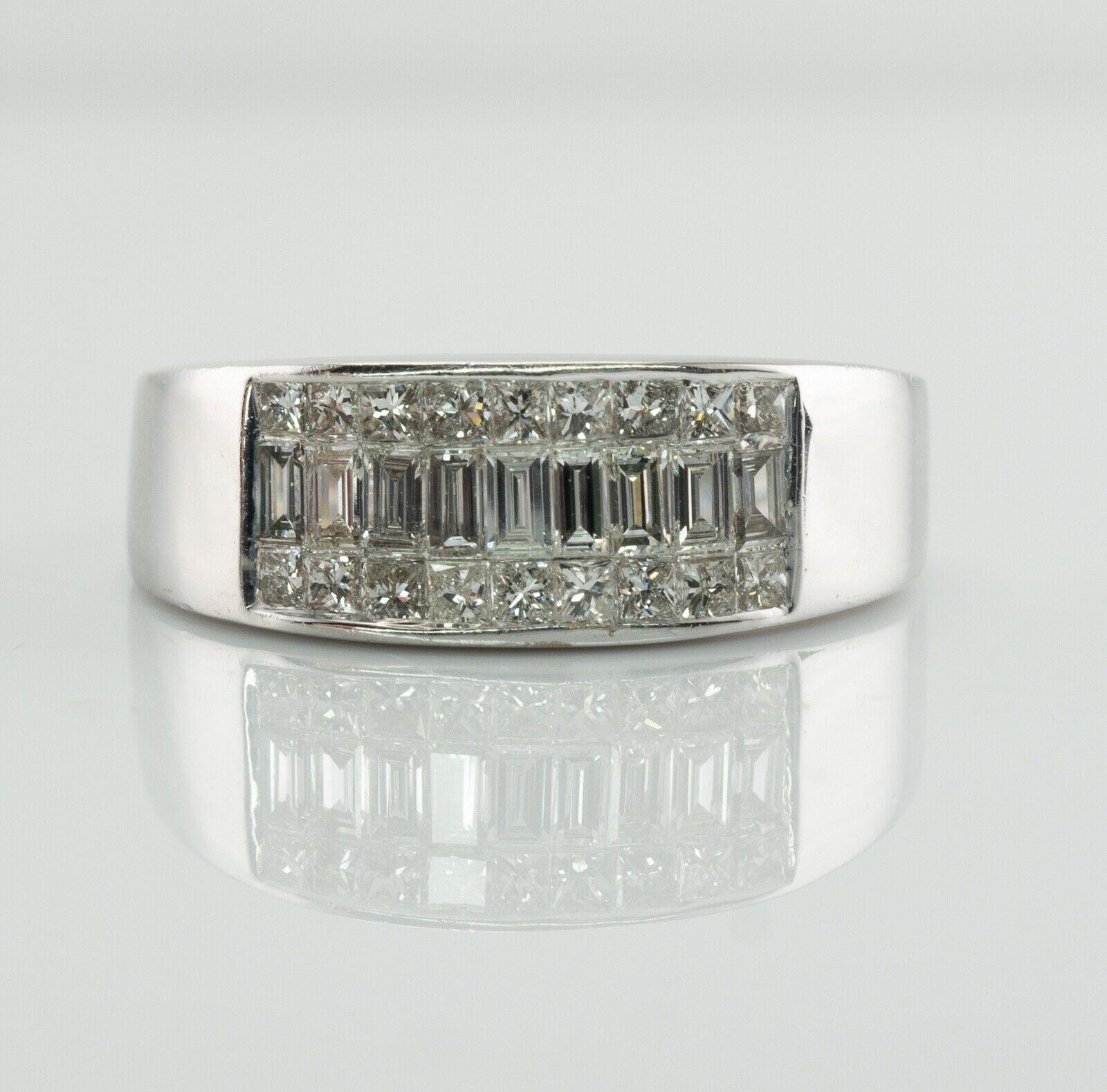 Diamond Ring 14K White Gold Band 1.80cts Anniversary or Wedding
 
This estate ring is crafted in solid 14K White Gold (stamped). 
The band holds 9 diamond baguettes and 18 square cut diamonds = 1.80cts TDW.
The diamonds are very clean VVS2-VS2