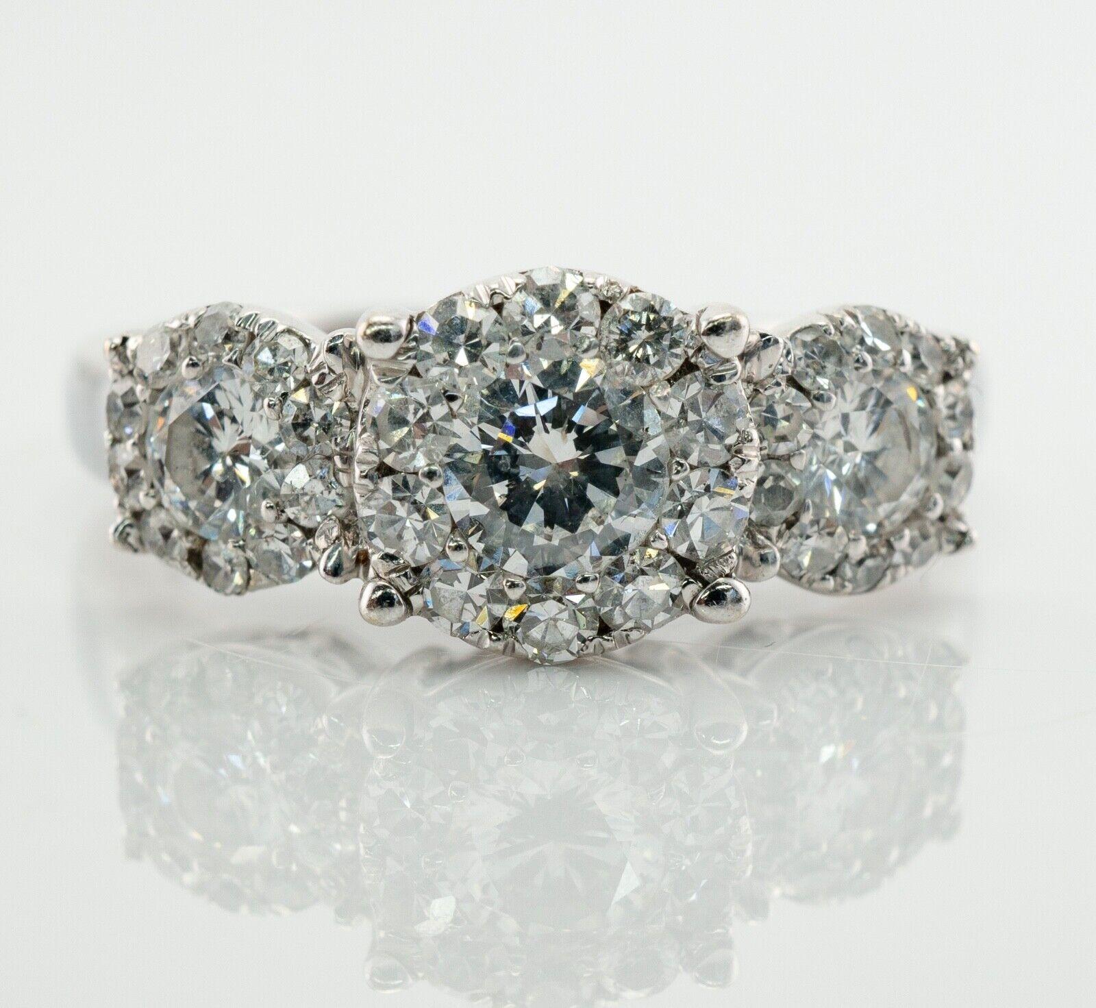 Anillo de diamantes de oro blanco de 14 quilates Halo Boda de compromiso 1,63 TDW

Este anillo de compromiso está fabricado en oro blanco macizo de 14 quilates
El diamante central redondo de talla brillante es de 0,33 quilates de claridad SI2 y