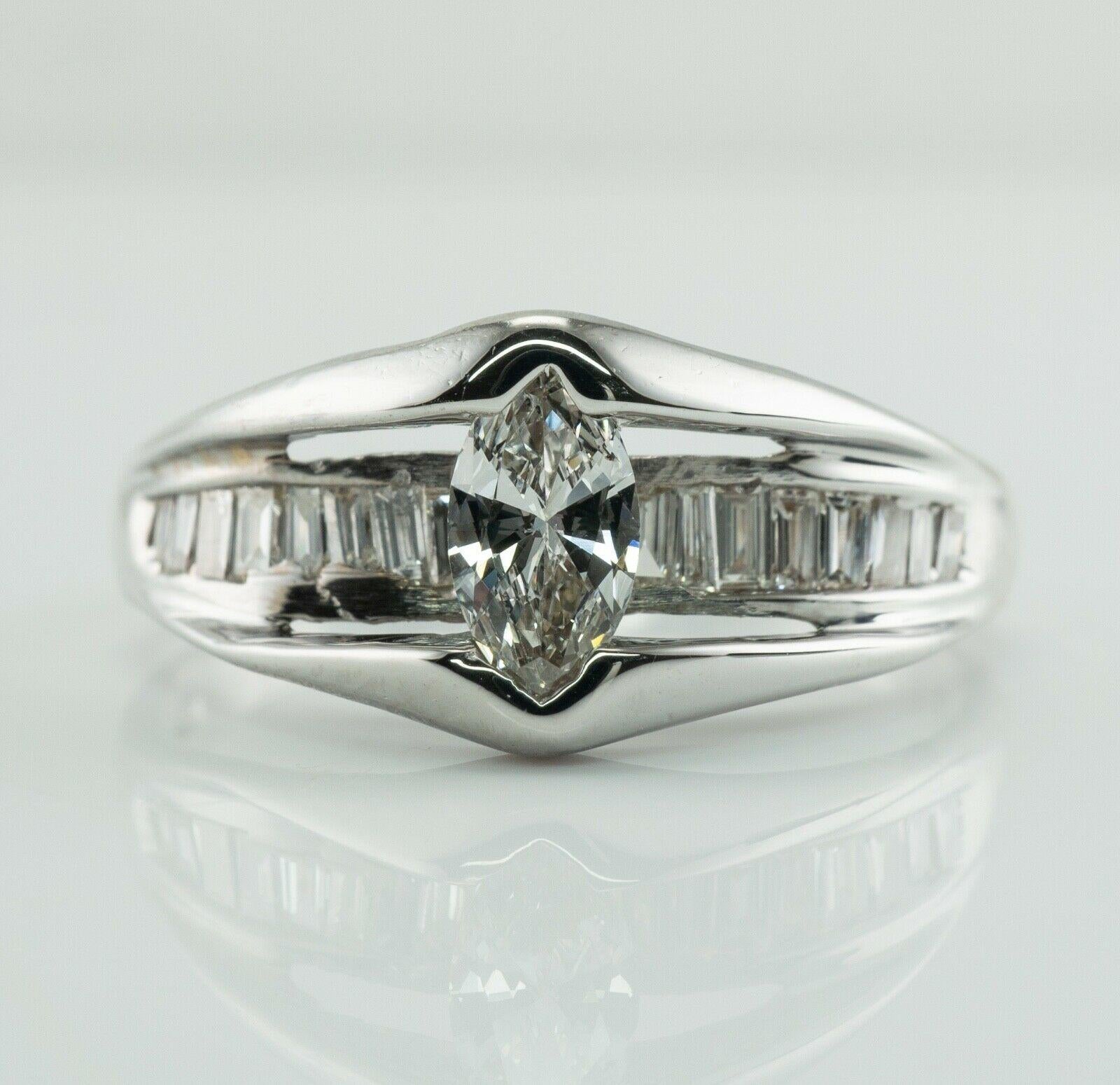 Diamond Ring 14K White Gold Band Marquise Cut Engagement

This estate ring is crafted in solid 14K White Gold
The center marquise cut diamond is .50 carat of VS2 clarity and H color.
18 channel diamonds total .54 carat of SI1-SI2 clarity and H