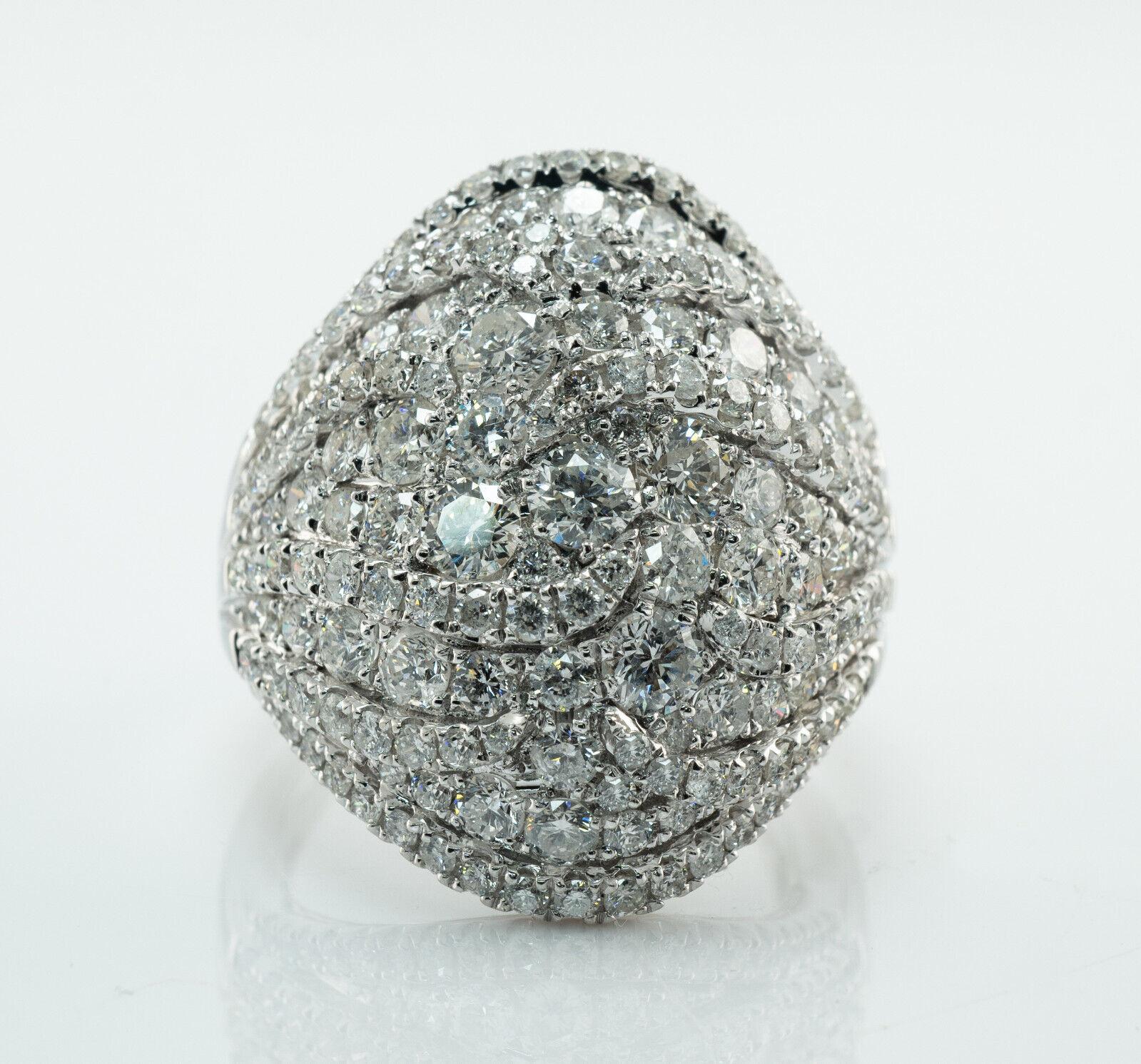 Diamond Ring 14K White Gold Cluster Cocktail 3.00ct TDW VJ

This spectacular estate ring is finely crafted in solid 14K White Gold.
Hallmarked VJ inside of the shank.
The ring is studded with round brilliant cut diamonds.
The diamonds range from VS1