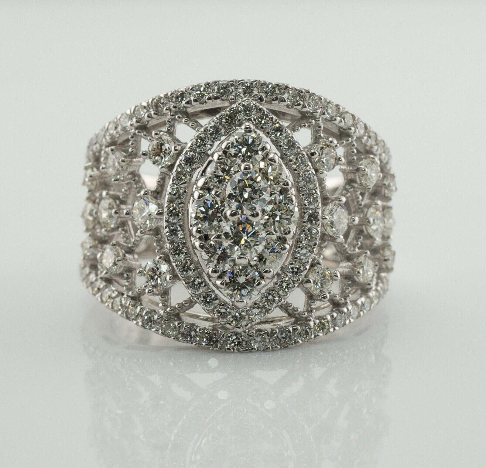 Diamond Ring 14K White Gold Wide Cocktail 1.45cts Cluster

This estate ring was a part of estate jewelry auction, the tag is still attached.
It is crafted in solid 14K White Gold and set with natural round brilliant cut diamonds.
The diamonds total