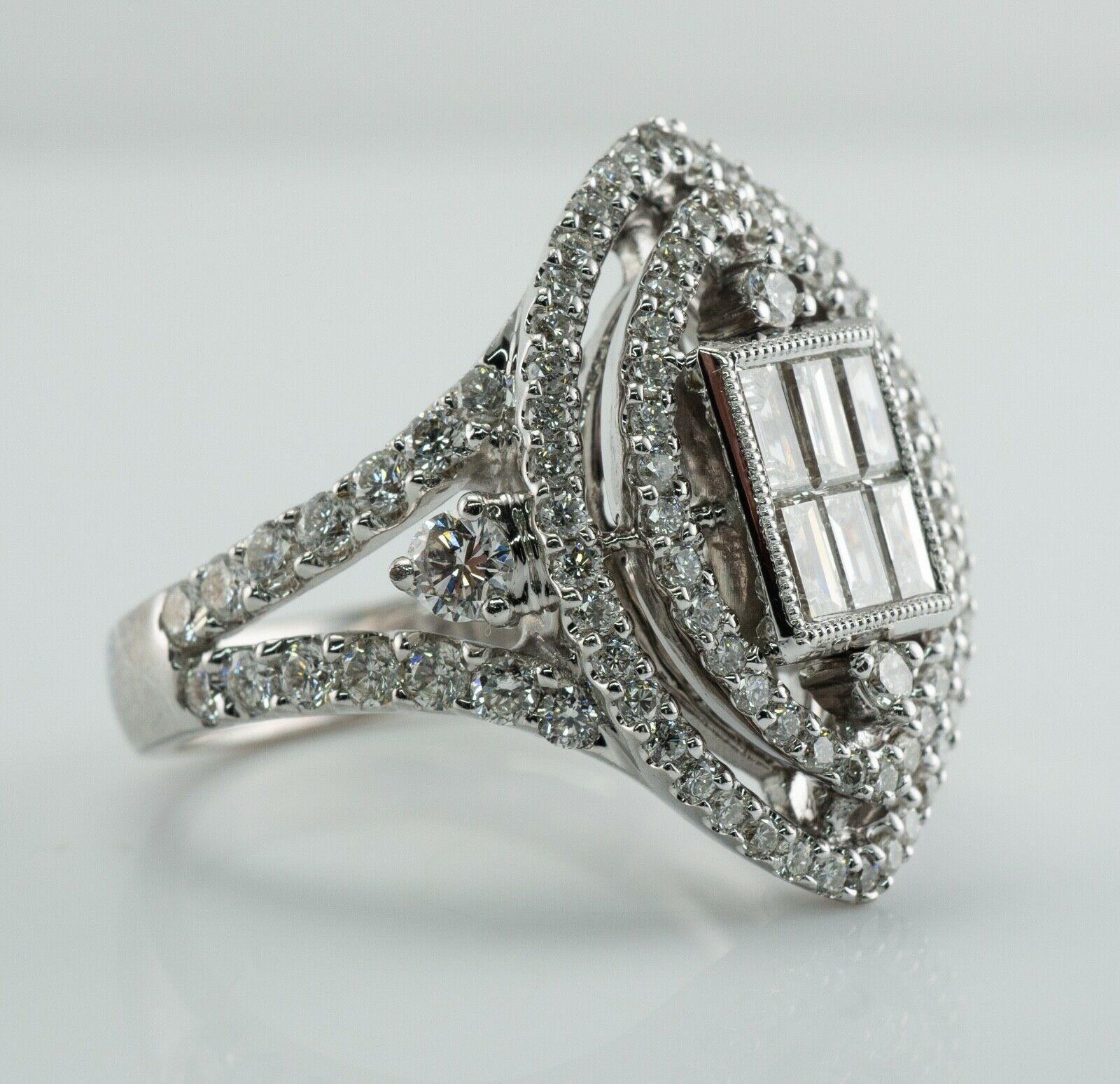 This beautiful estate ring is crafted in solid 14K White Gold. 
Six rectangular cut diamonds total .60 carat of VS2-SI1 clarity and H color.
There are 98 round cut diamonds from .01 carat to .07 carat totaling 1.27 carats of SI1 clarity and H