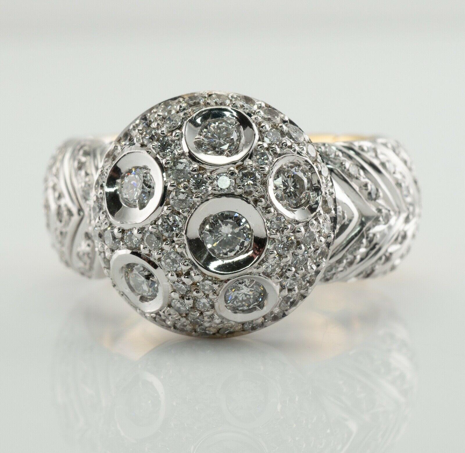 Diamond Ring 18K White Yellow Gold Band 1.25 TDW Moon

This unusual estate ring is crafted in combination of solid 18K White and Yellow Gold.
The face of the ring is set in the Moon like cluster of diamonds.
Six round brilliant cut diamonds