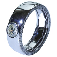 Bague en diamants demi-carat certifiés IGI d'environ 0,56 carat poids total / VS  Fabriqué à la main en Italie